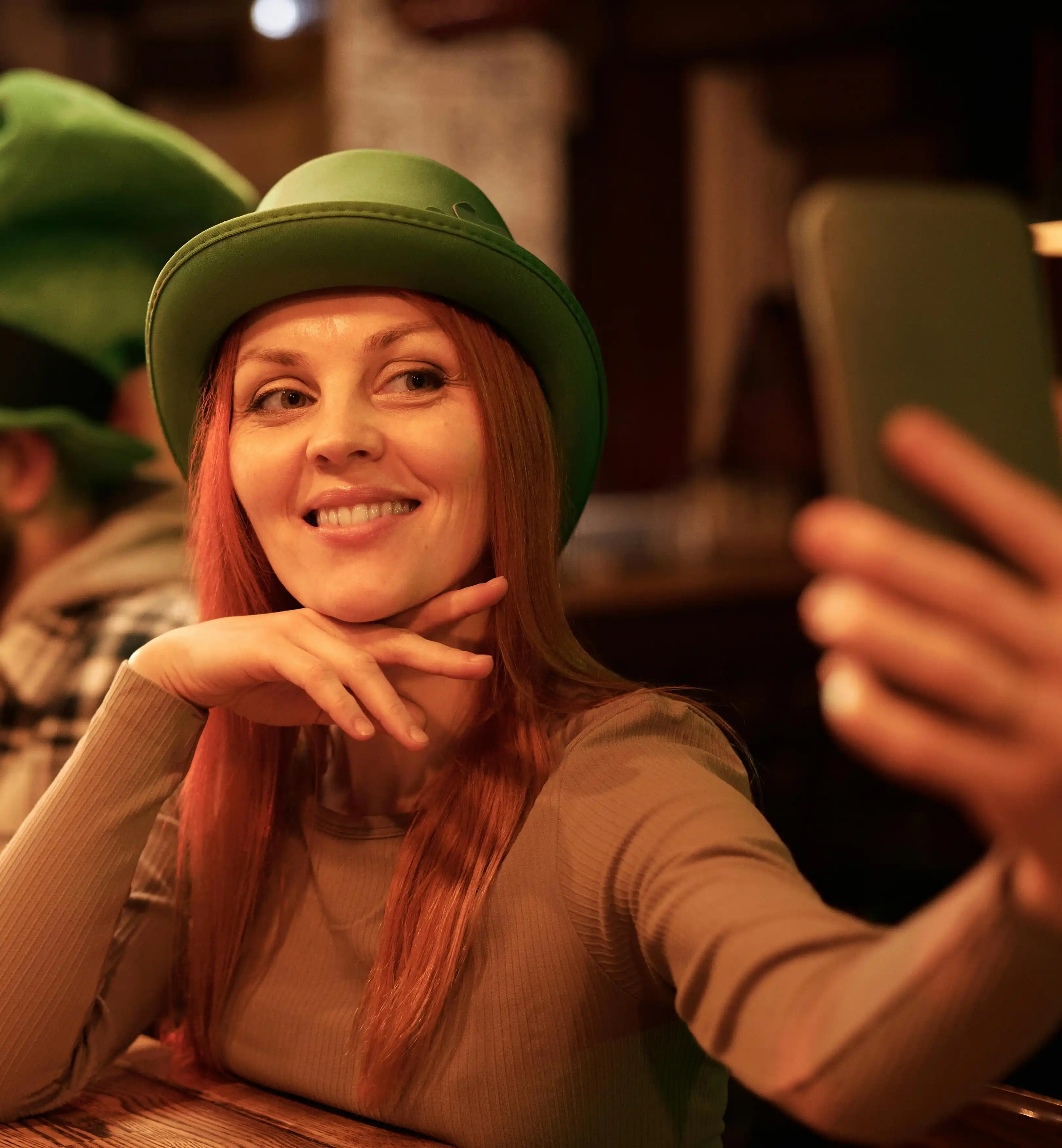 man and woman holding yellow ceramic mug