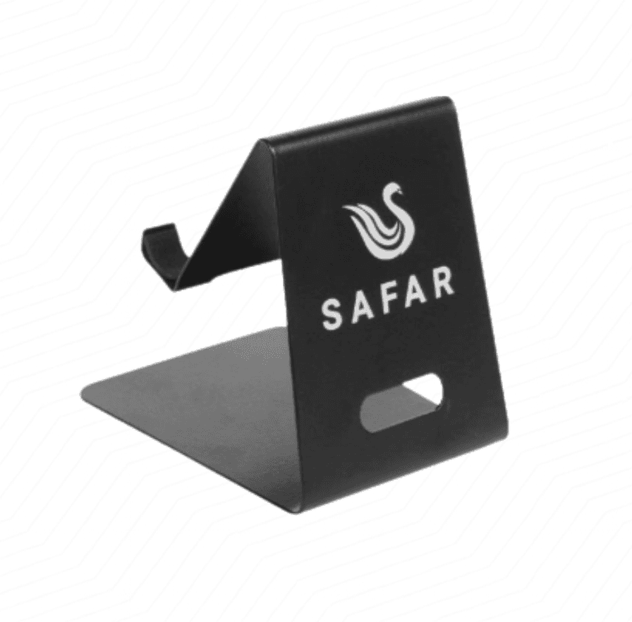 Woman having dark glasses in grey dress