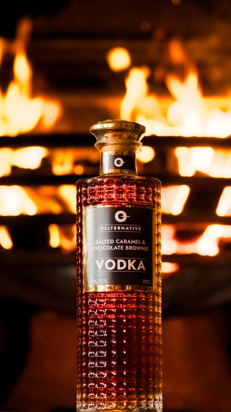 A luxurious presentation of a Manor spirit in a premium bar, reinforcing its status as a top-tier alcohol brand.