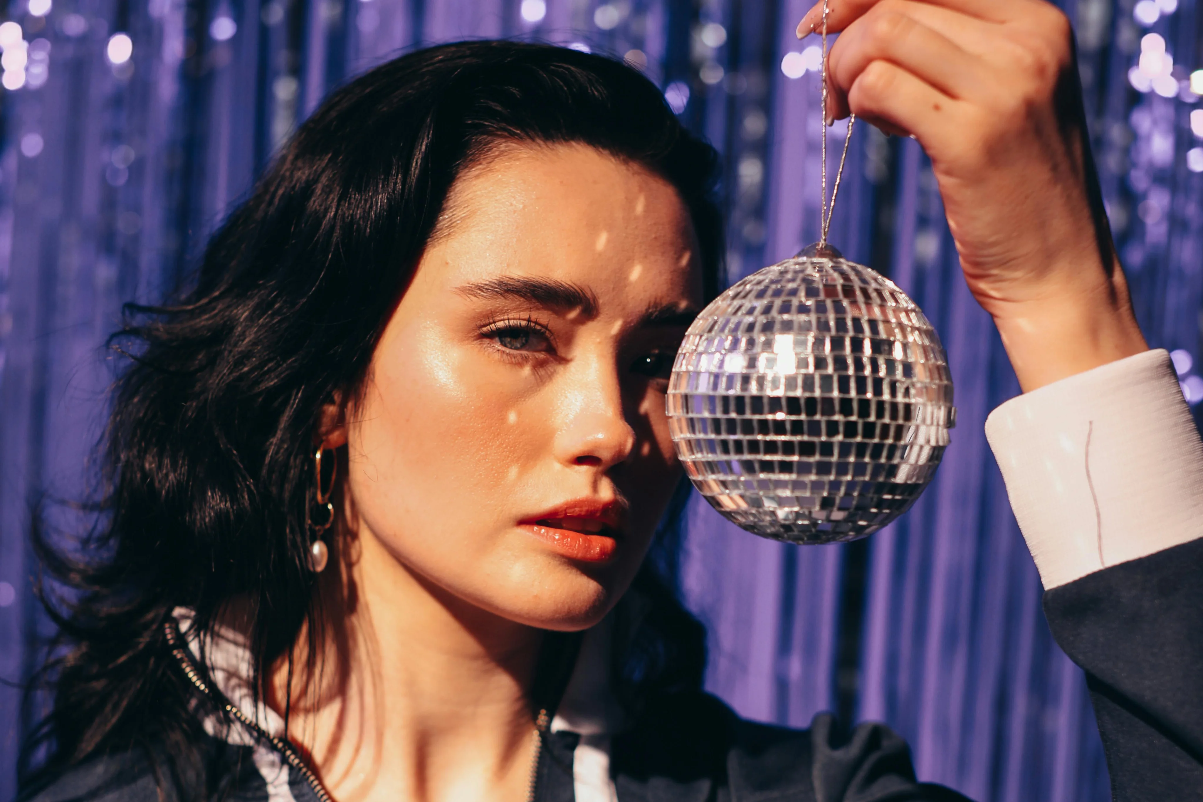 Amelia Reed closeup with disco ball