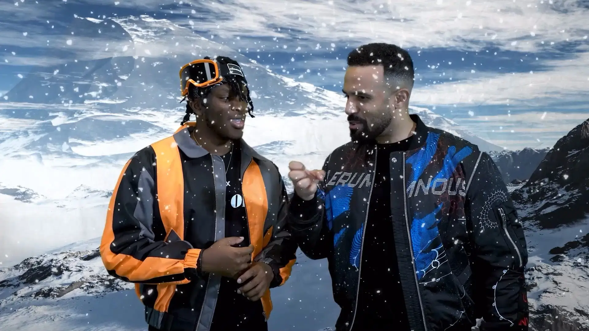 Artists KSI and Craig David conversation during a filmed livestream set against a snowy mountain backdrop.