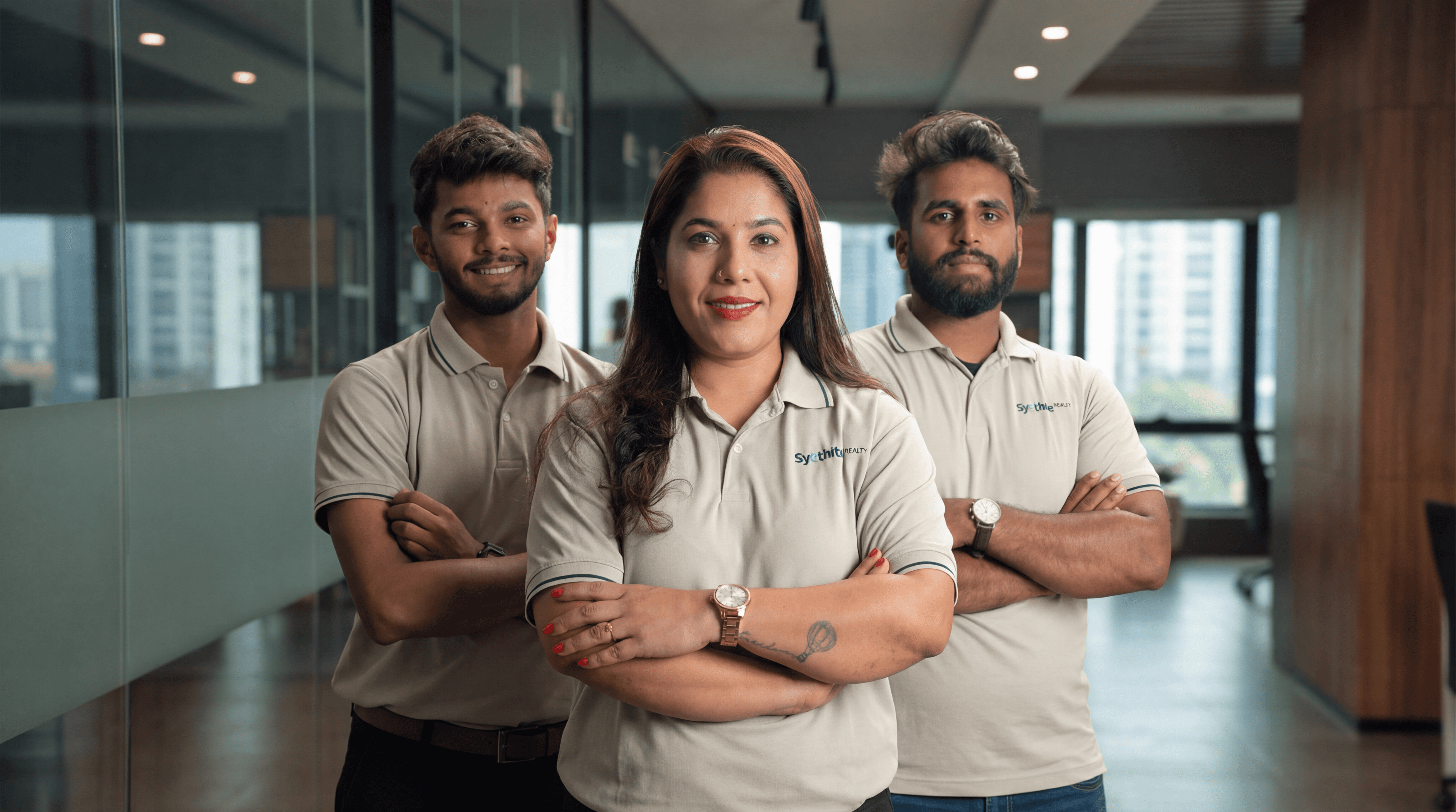 A silhouette of a person wearing sunglasses, with tousled hair, against a teal background.