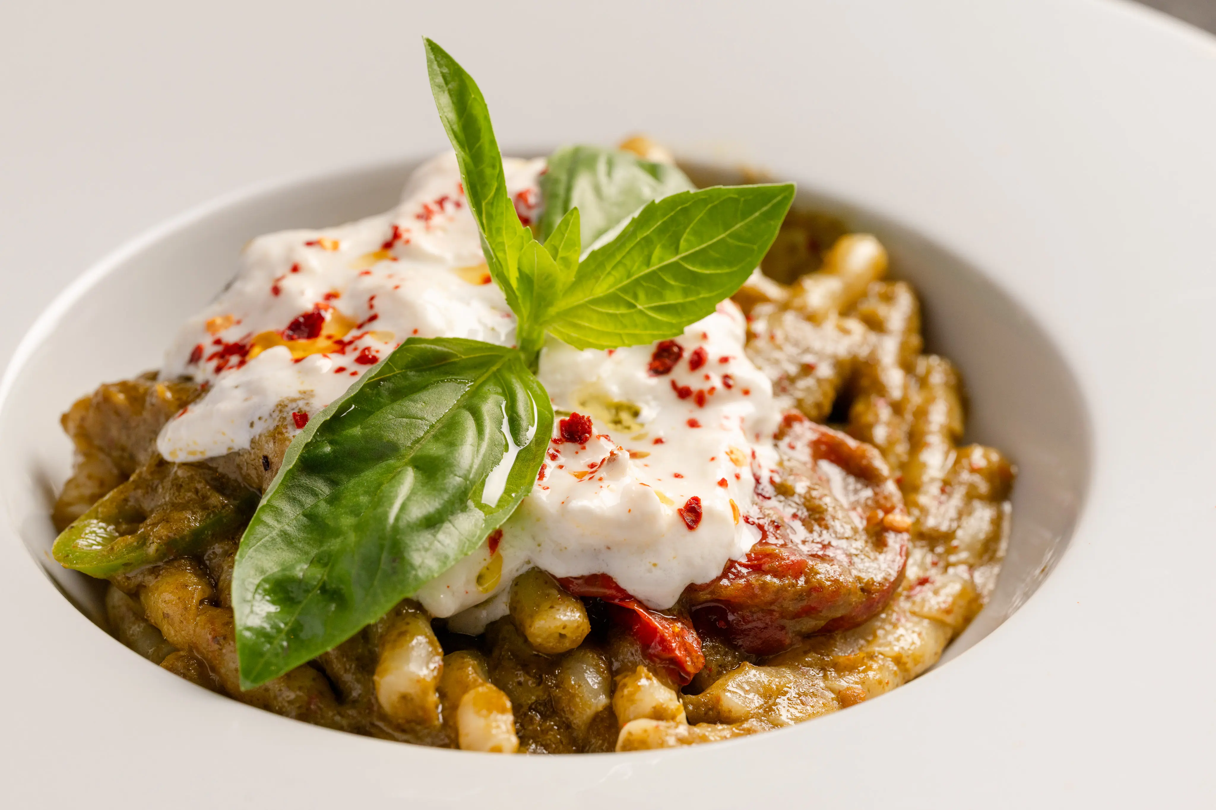 Burrata-topped pasta served at ‘O Ver Borough, one of the best restaurants near Tower Bridge.