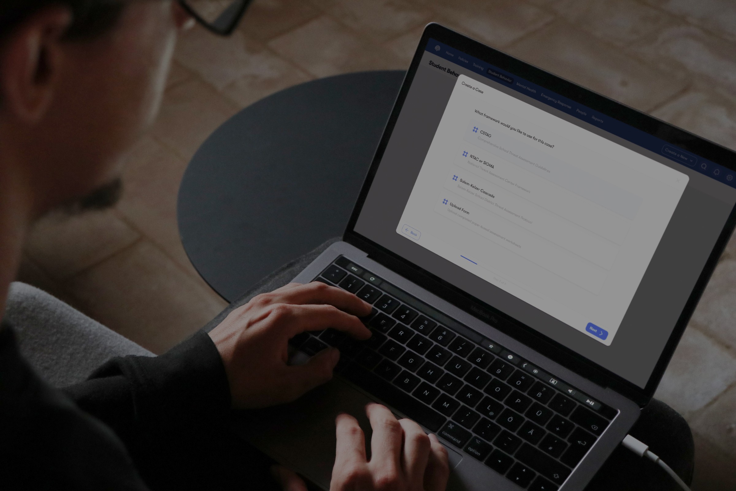Image of a mockup of Impact Suite software dashboard. It shows the user the number of concerns and cases, it shows a concerns timeline, it lists the top students who need personal care, and it gives details into who has/has not compnleted safety trainings and policy acknowledgements.