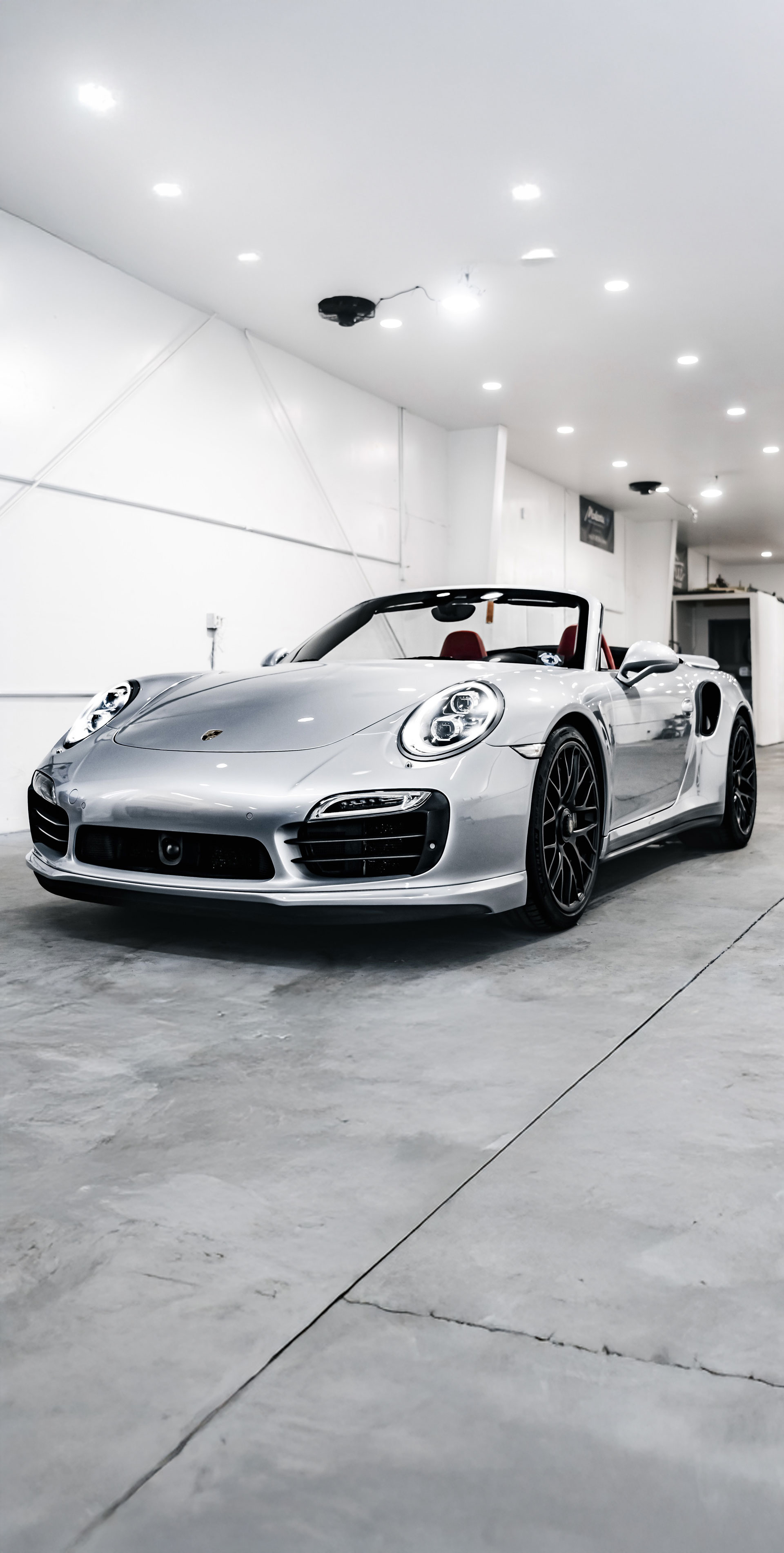 man in red suit posing in the night