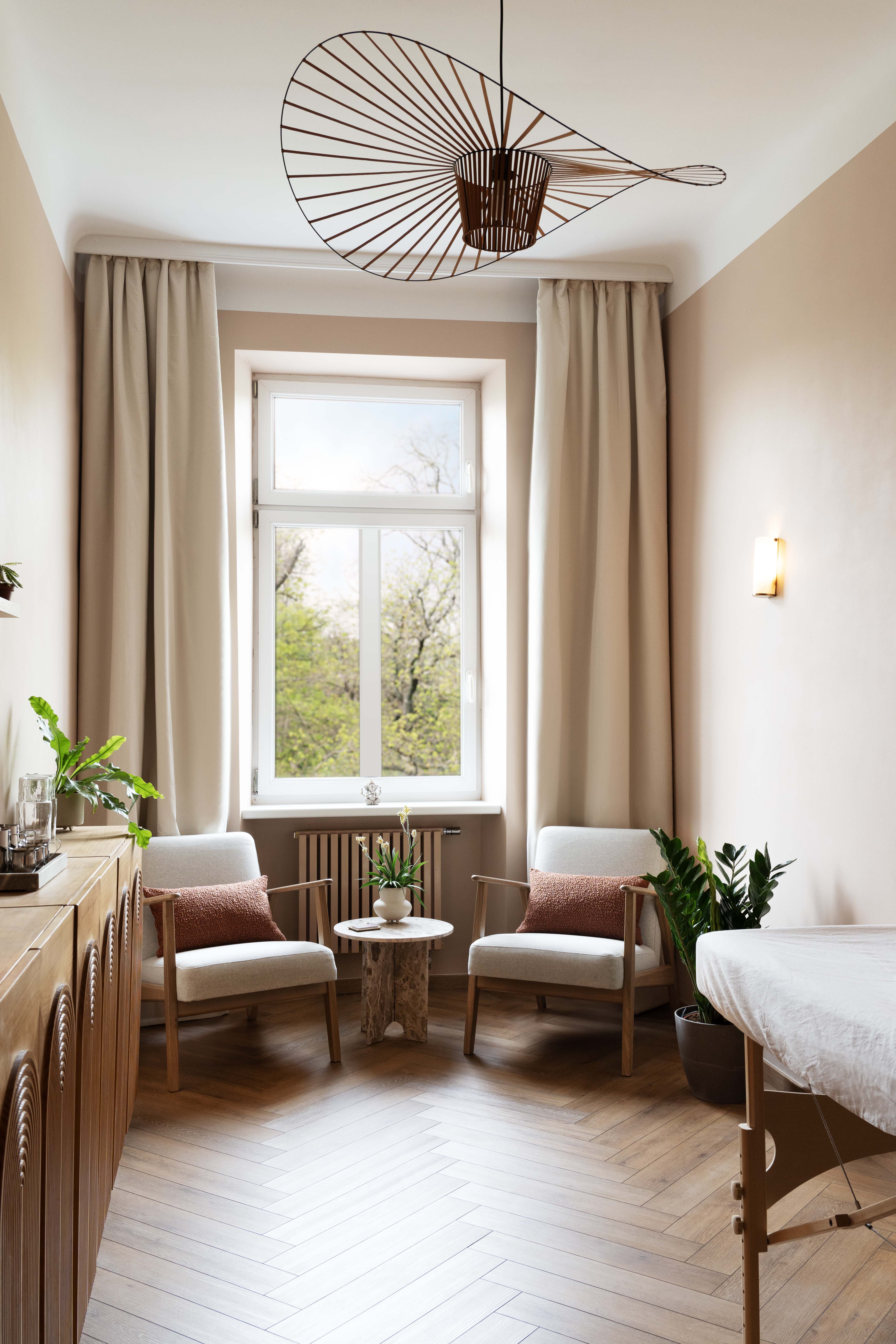 Massage Studio with two chairs and plants, friendly calm setting