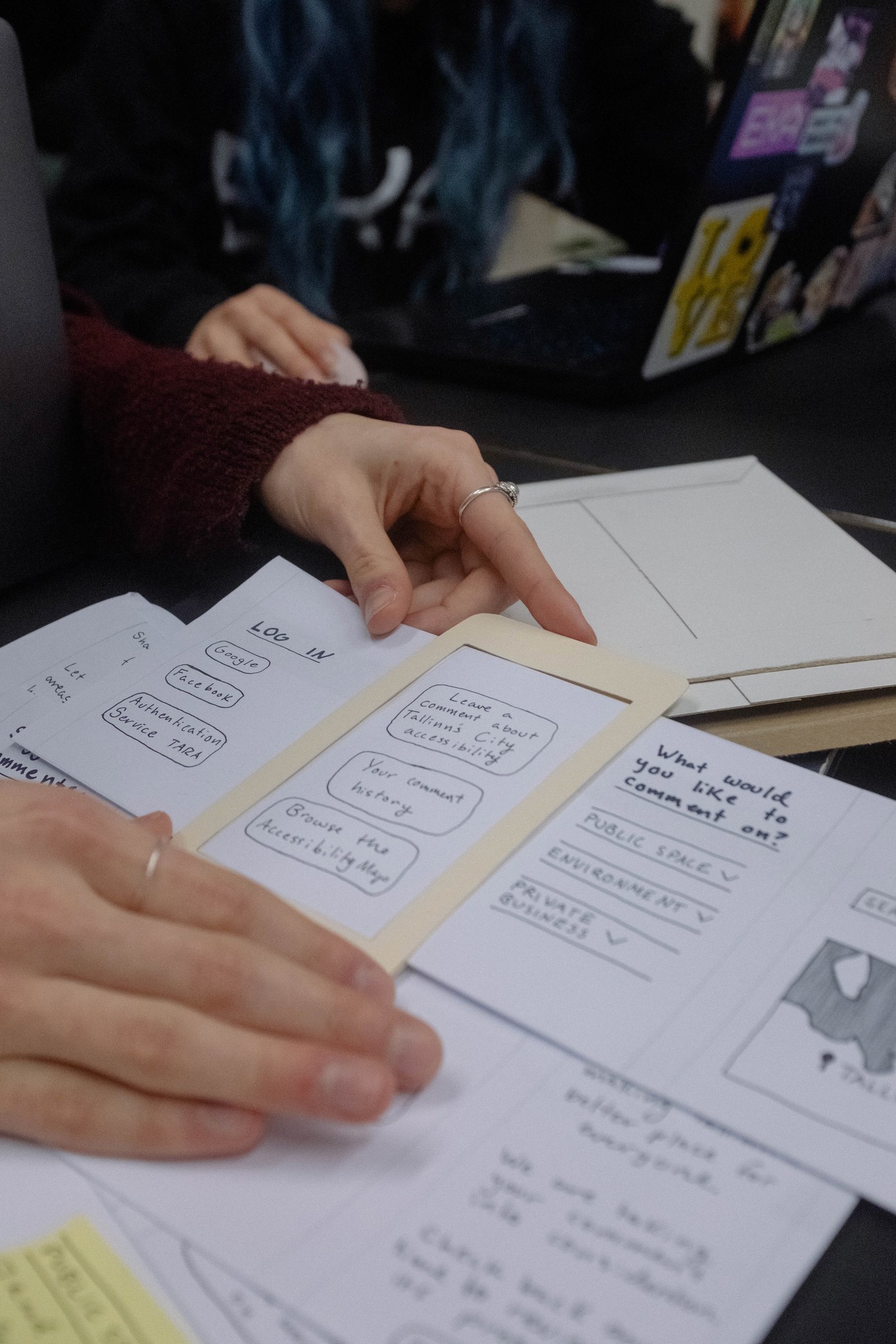 Me Testing a "Dirty" Paper Prototype of My Solution