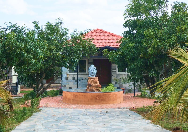 A flower-filled ring floats in fluffy clouds.