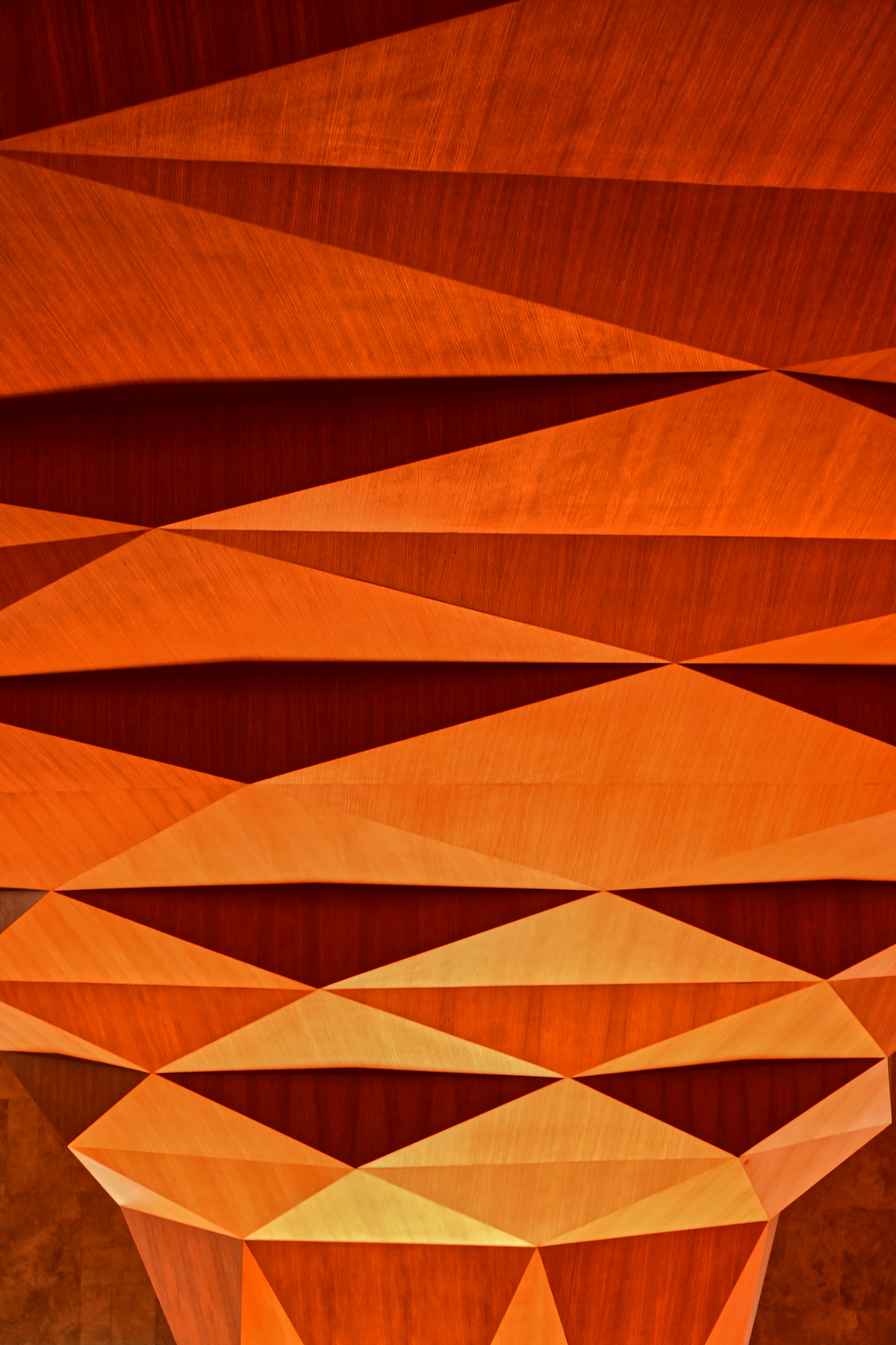 Geometric wood pattern with warm orange tones