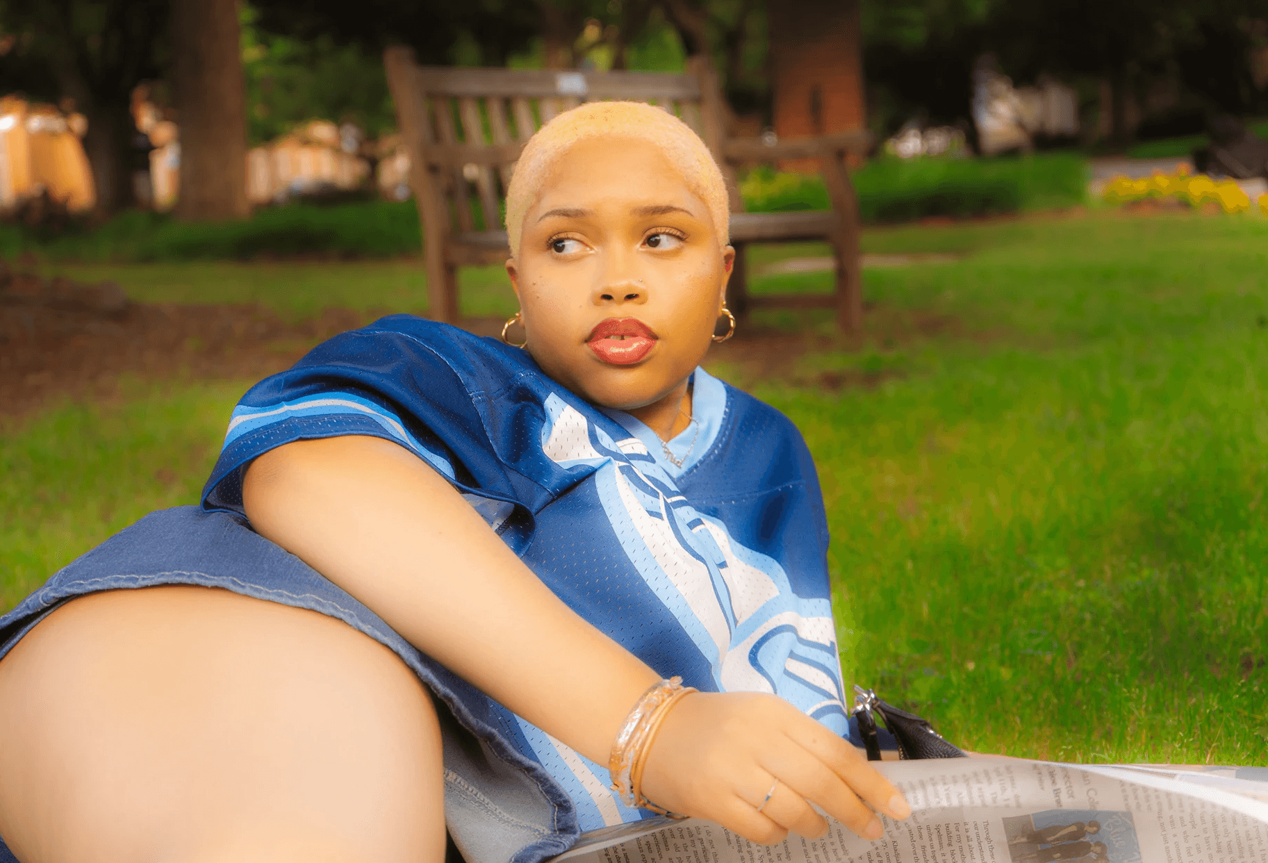 A woman sitting in a photo studio