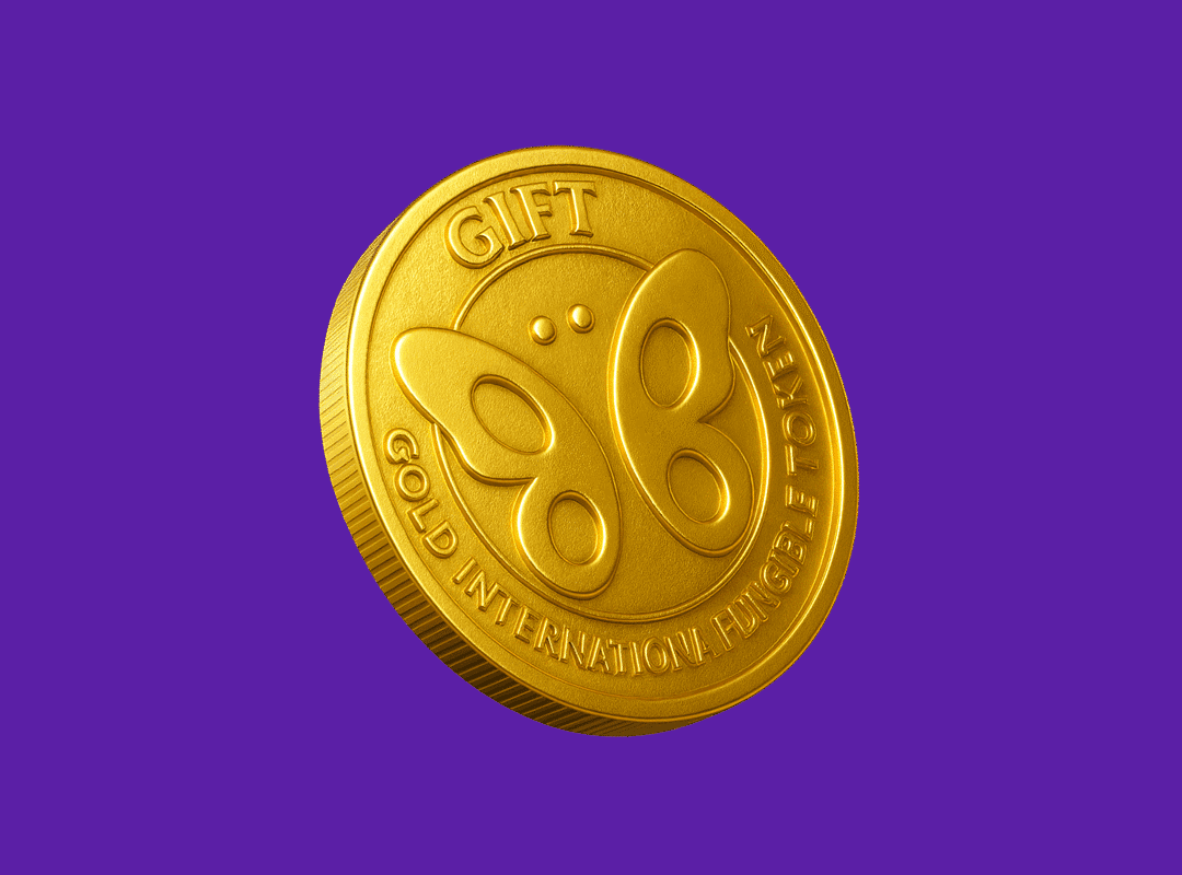 A 3D digital illustration of a gleaming golden coin floating at an angle against a solid, vibrant purple background. The face of the coin features an embossed design of a stylized butterfly in the center. The word "GIFT" is stamped in bold capital letters along the top edge, while the phrase "GOLD INTERNATIONAL FUNGIBLE TOKEN" curves along the bottom. The coin has a finely ridged edge and a textured metallic surface that realistically catches the light.