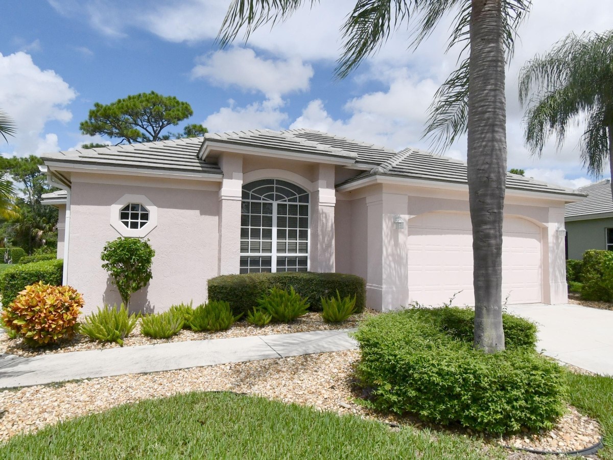 1994 New Roof Construction in Marsh Landing, PGA Village, Port St Lucie with Entegra Flat Broomswept Tile in Natural Gray