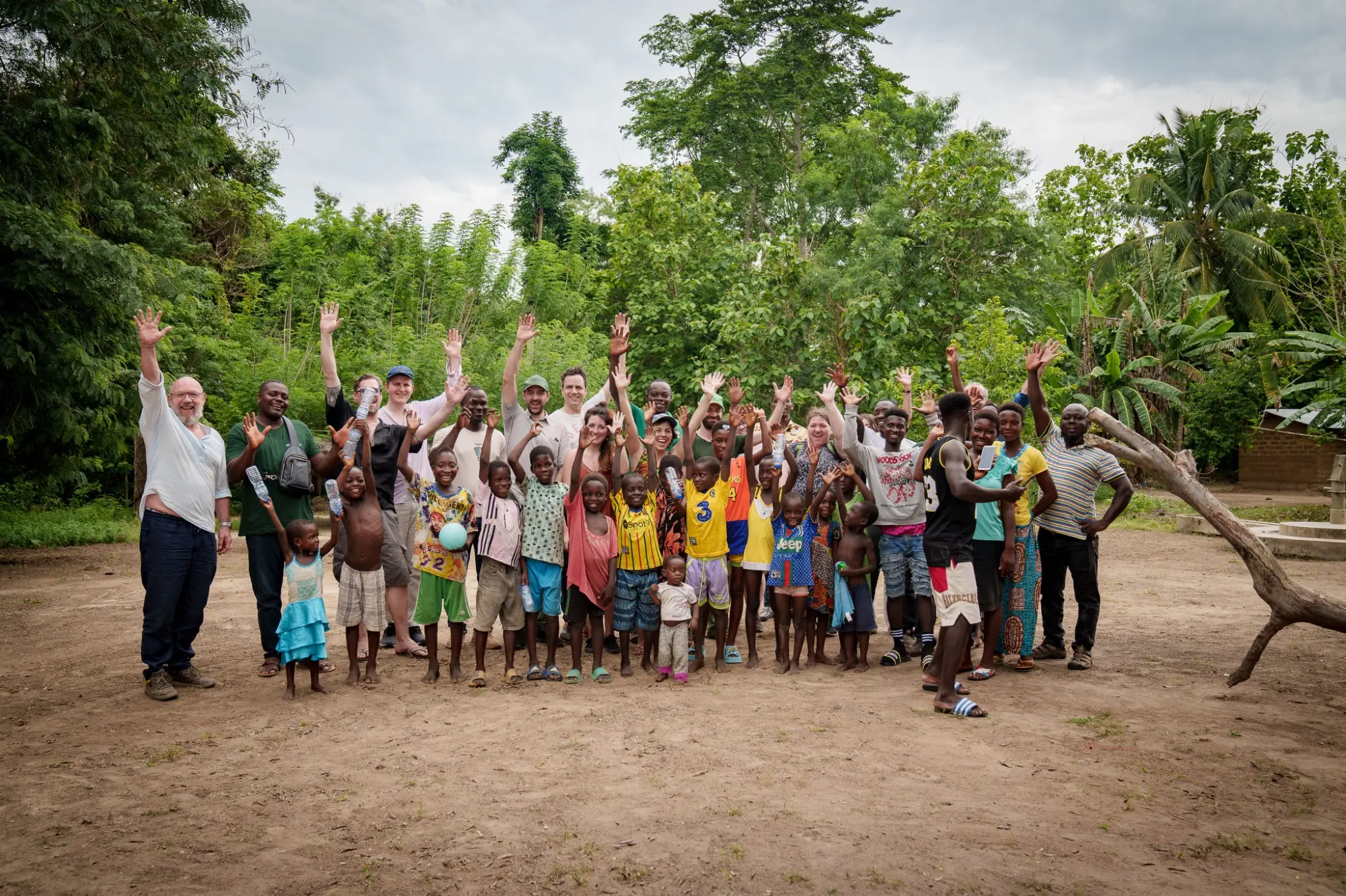 Large group of local project partners, families and natureOffice employees at PROJECT TOGO