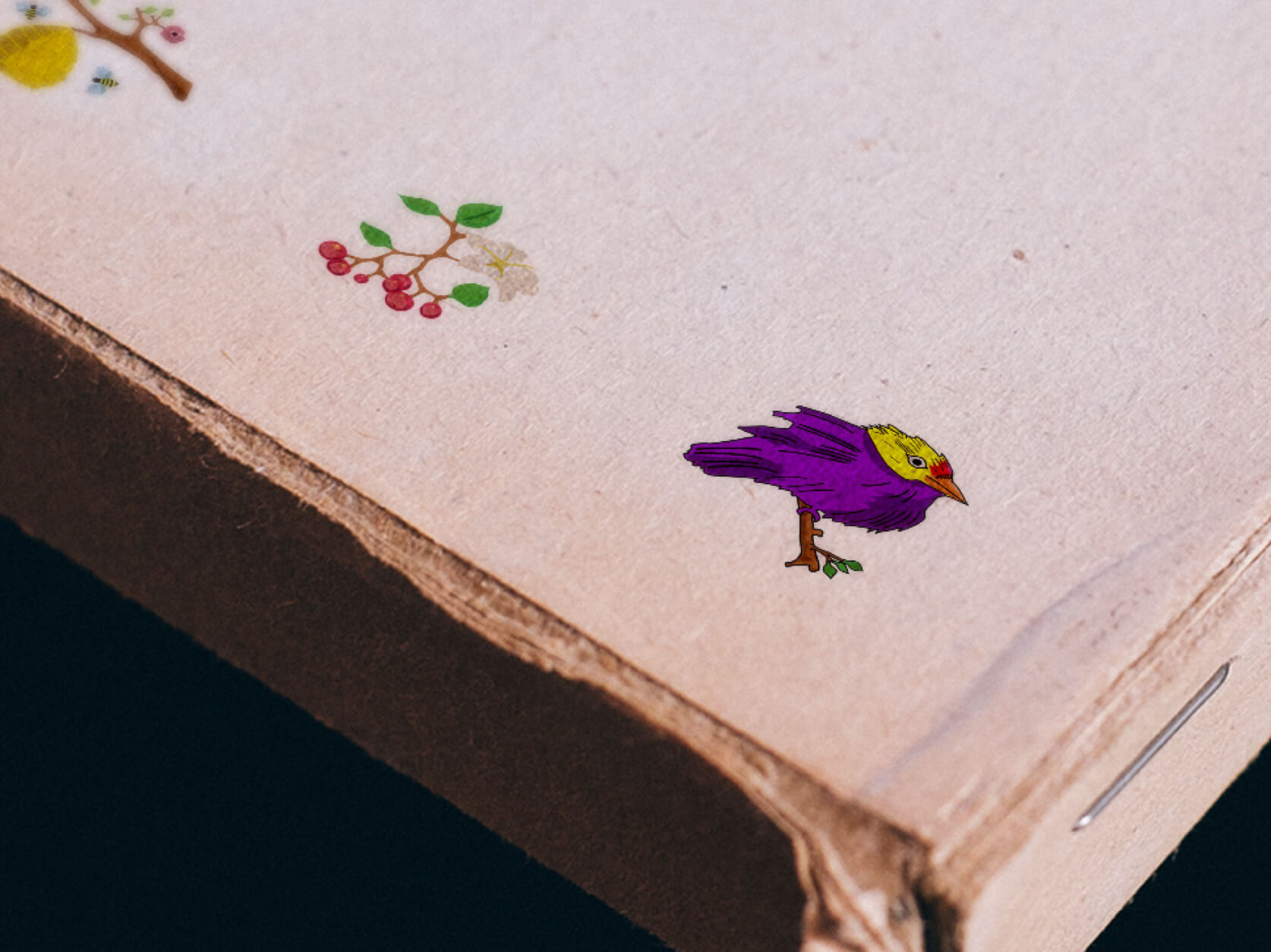 Illustration of a small bird on a folder.