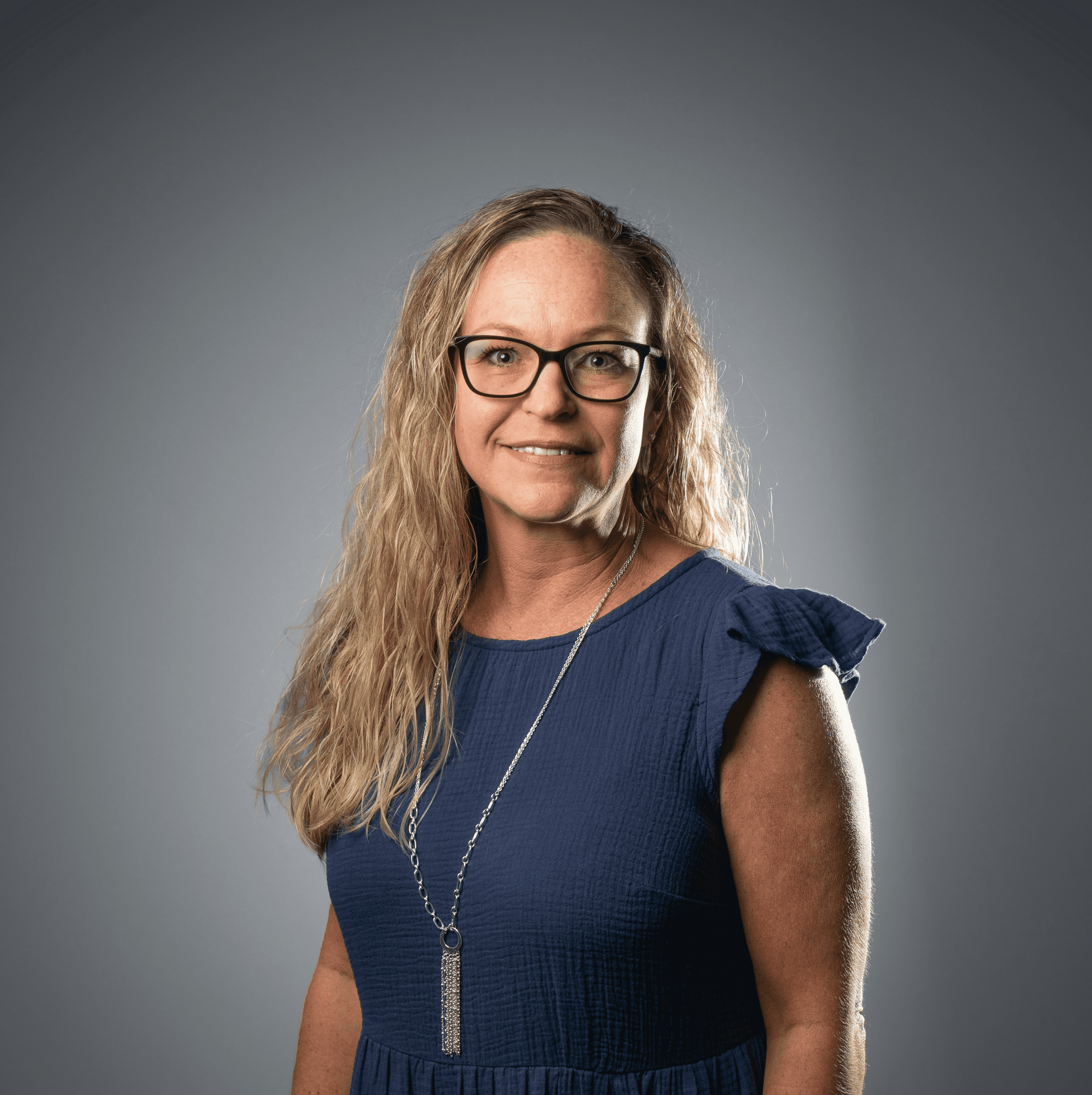 a woman in a blue dress
