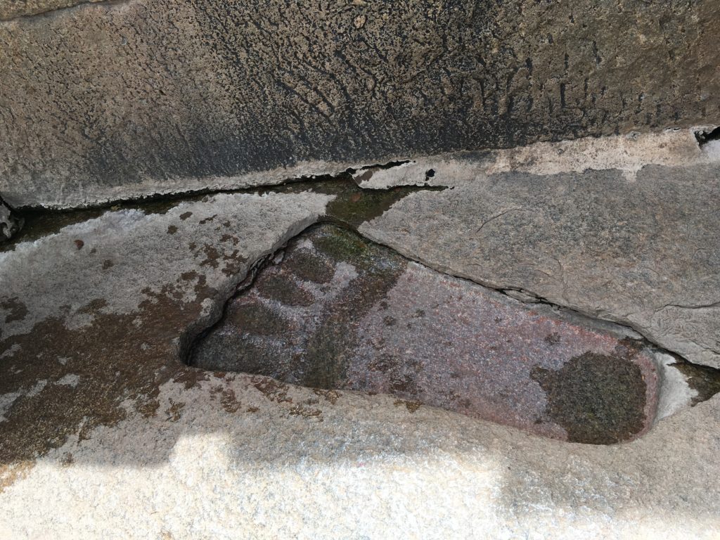 Sita's footprint on a granite floor at Veerbhadra temple at Lepakshi