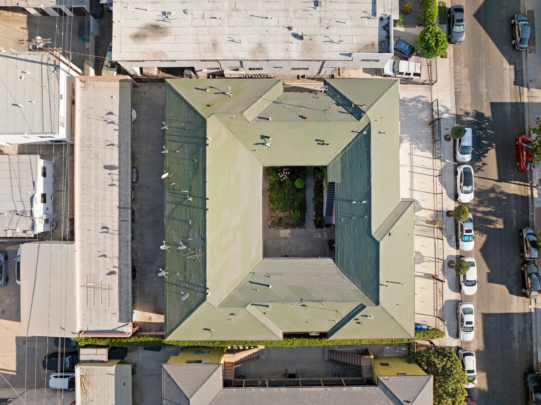 1640 N Harvard property overhead view showing central courtyard with green space and surrounding residential units