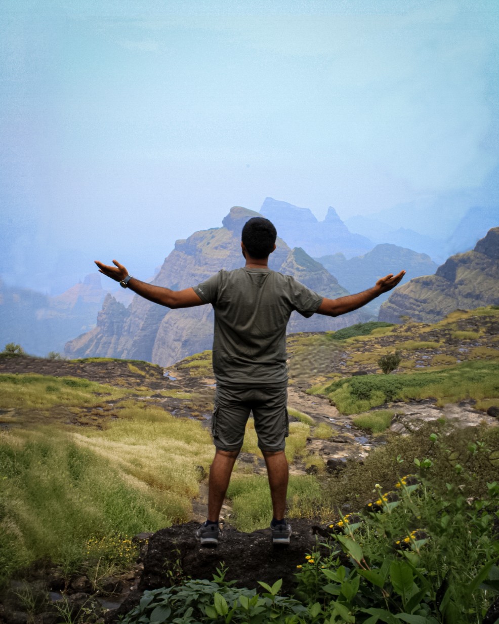 A young man riding a bicycle