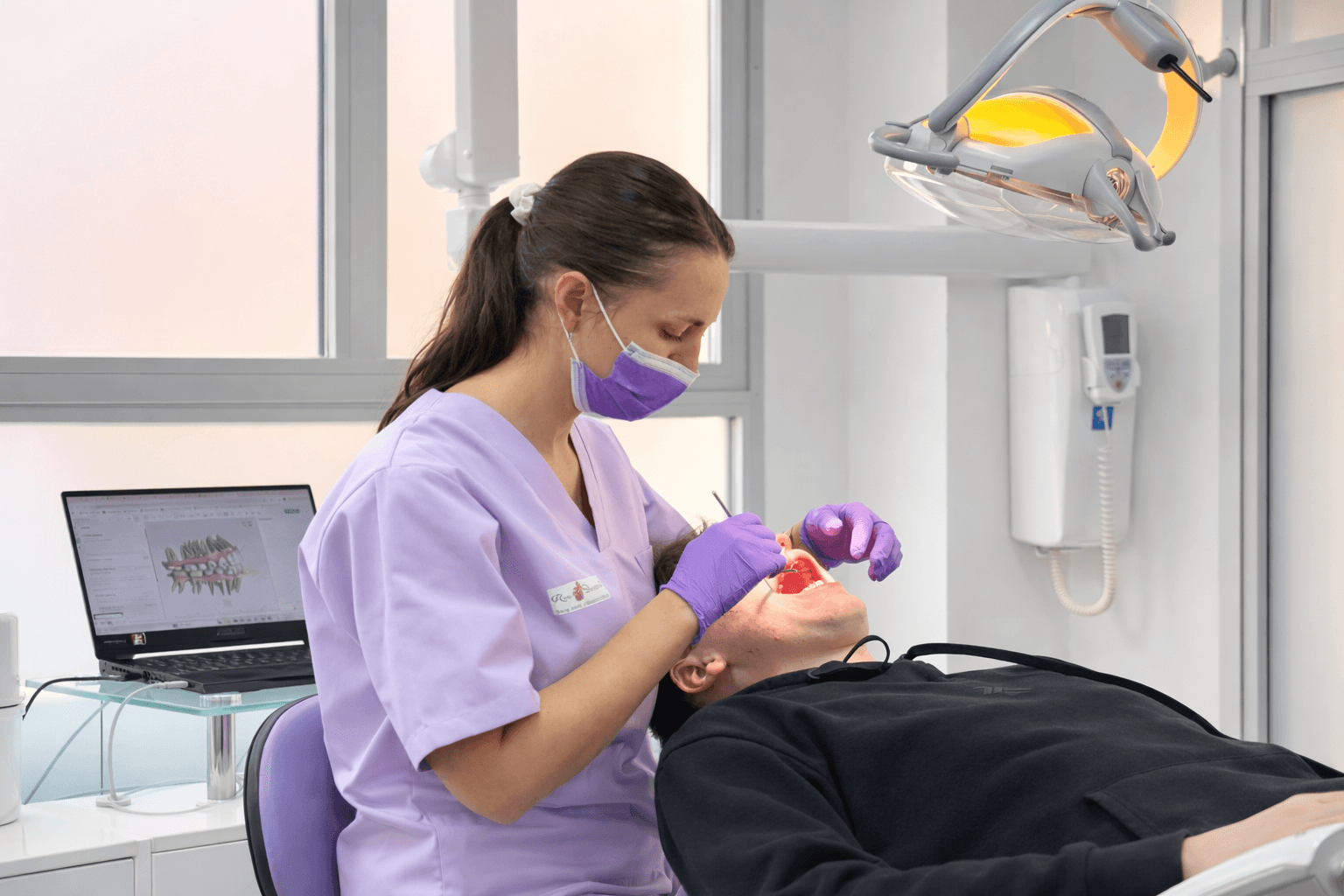 KUANTAN, Malaysia (Sept. 10, 2023) – Lt. Cmdr. Wilson Jing, Pacific Partnership 2023 dental team, conducts a dental exam at a community health fair at Kuantan City Mall during Pacific Partnership 2023, Sept. 10. Now in its 18th year, Pacific Partnership is the largest annual multinational humanitarian assistance and disaster relief preparedness mission conducted in the Indo-Pacific. (U.S. Navy photo by Mass Communication Specialist 1st Class Kegan Kay)
