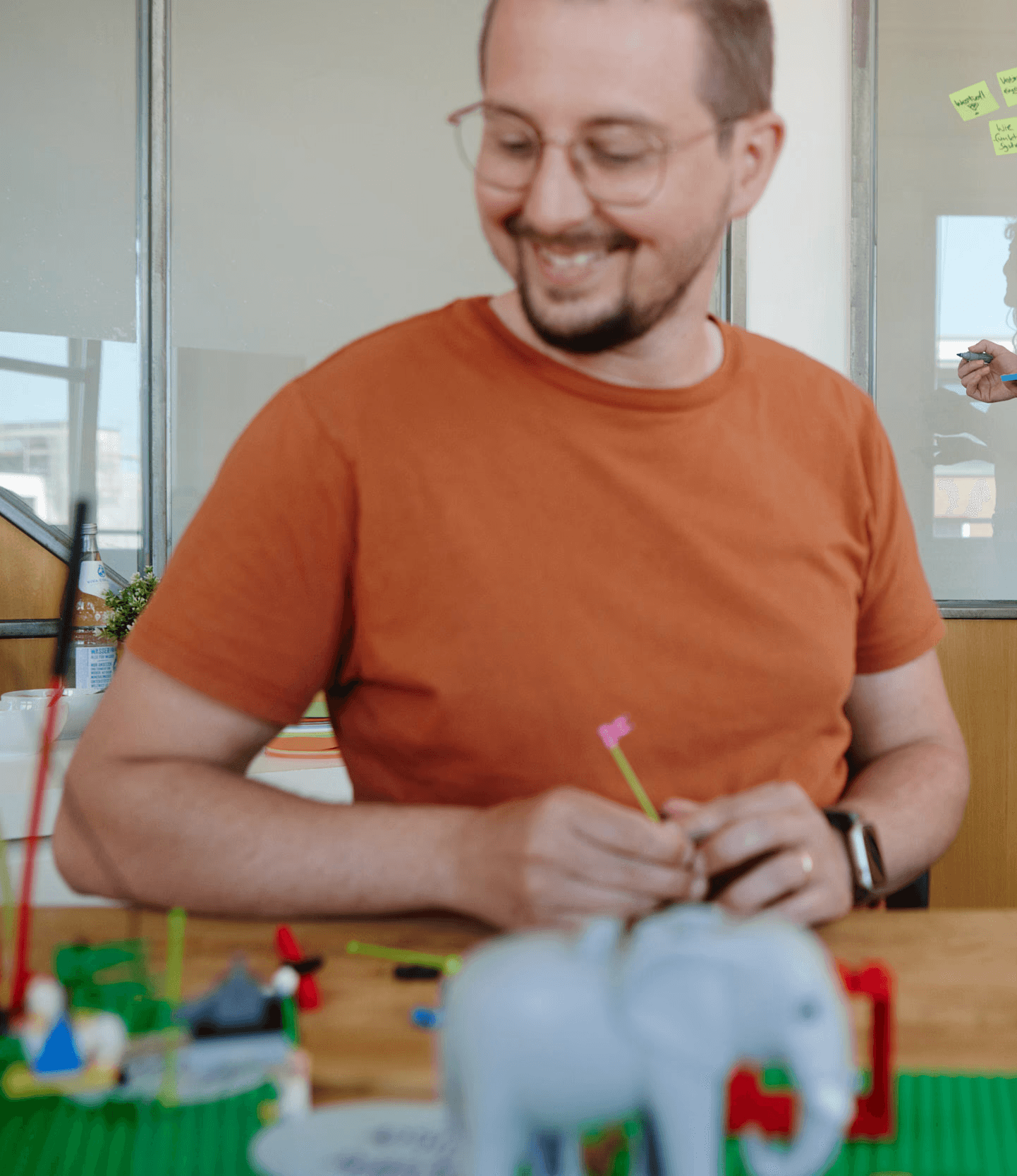 Close-up of a tree stump showing growth rings and a textured brown wood surface.