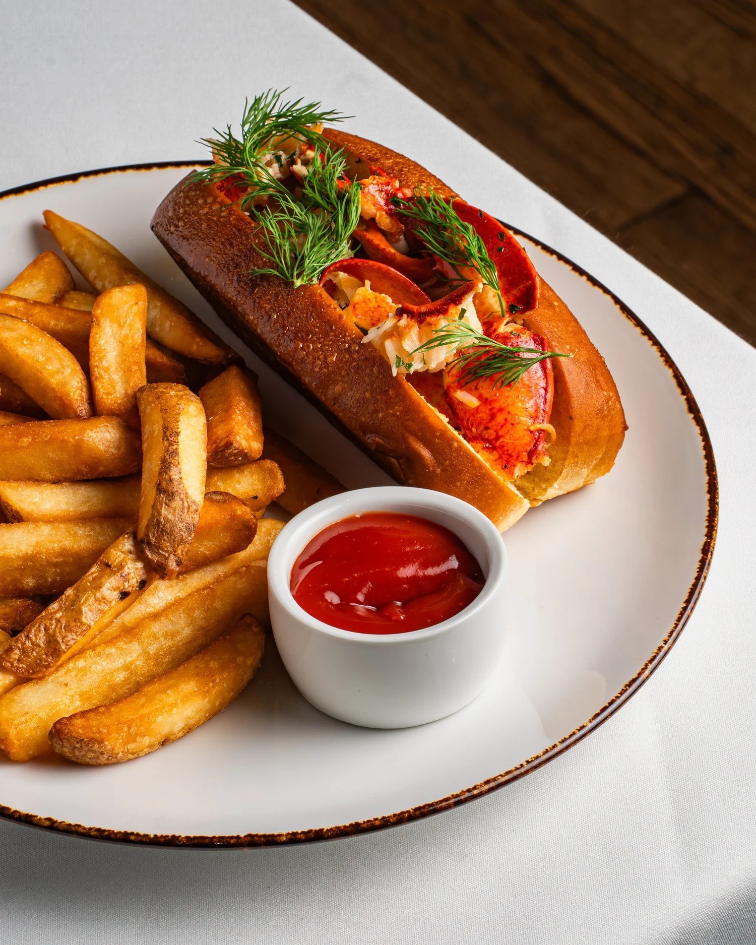 Lobster roll with fries