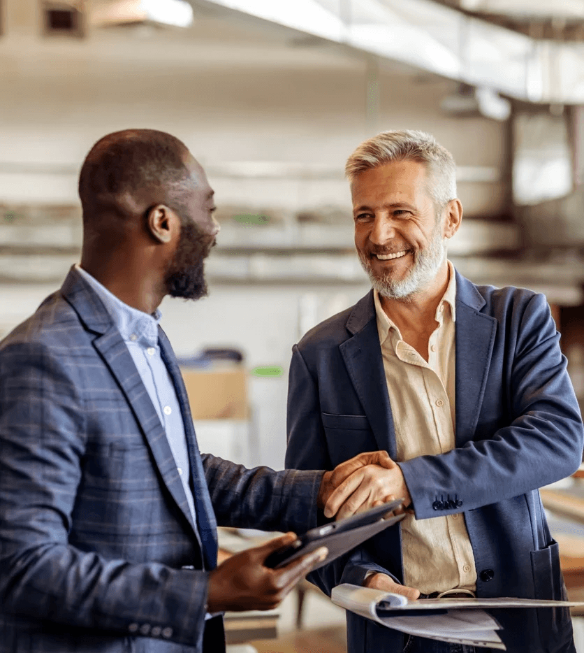 Two business men shaking hands