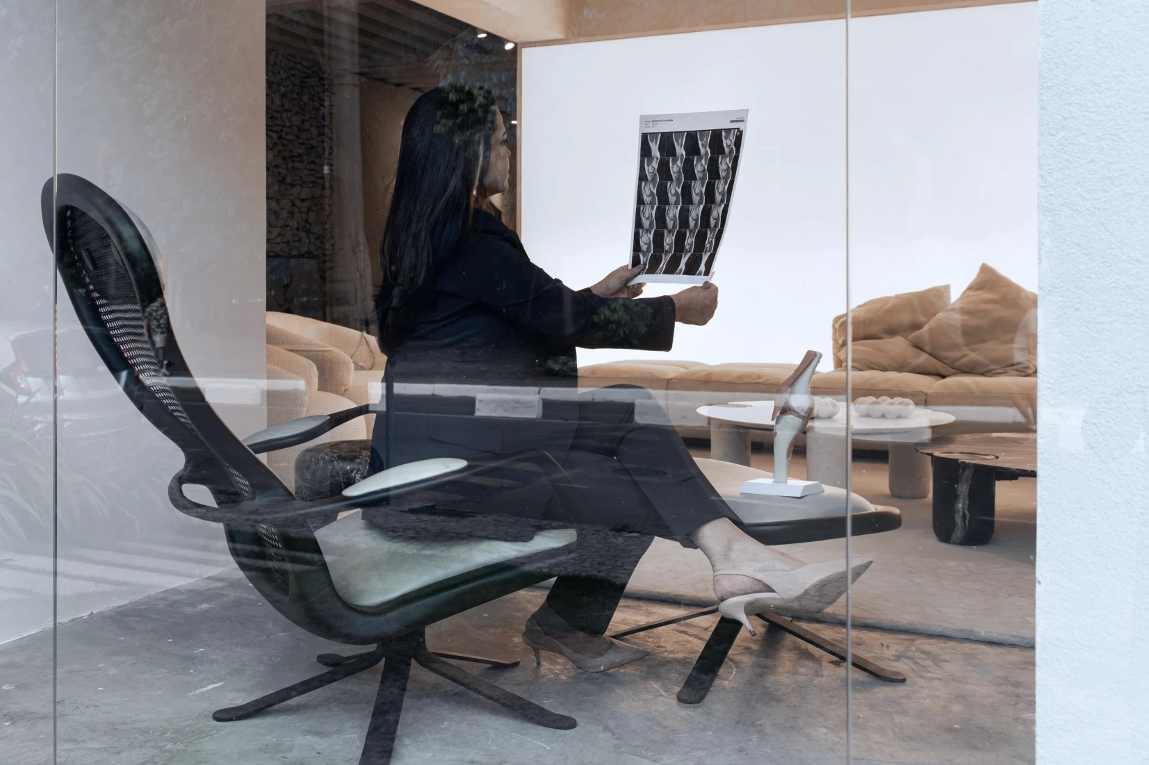 person sitting in a chair in front of a man