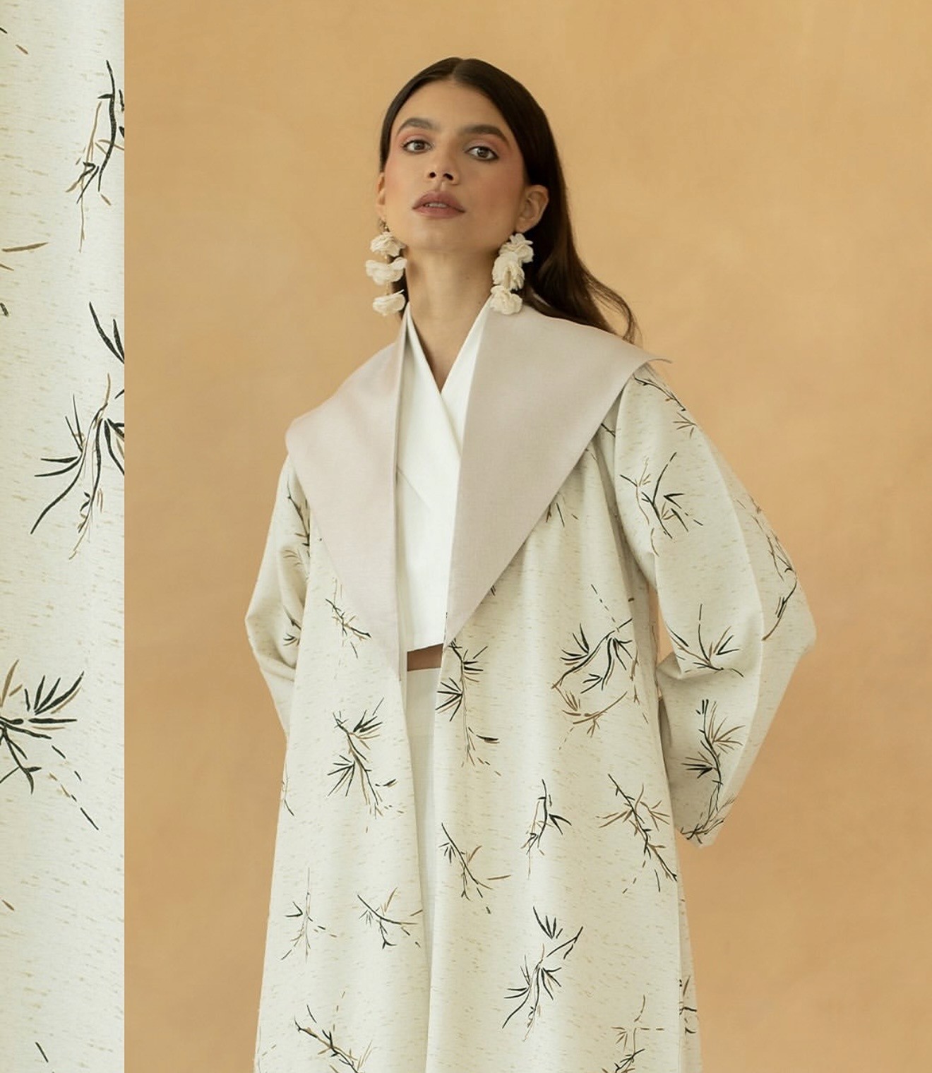 Fashion photoshoot with a woman posing in a dress