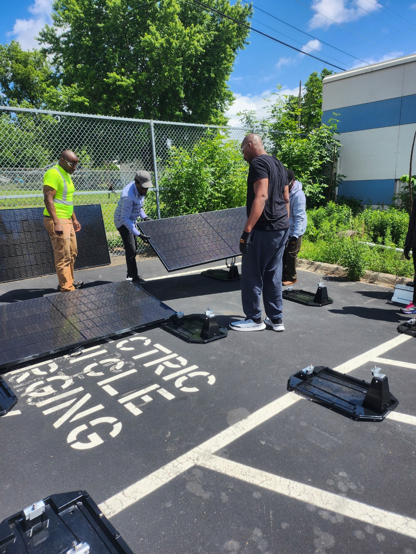 Worker installing solar panels