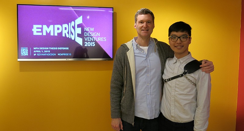 two men in front of screen