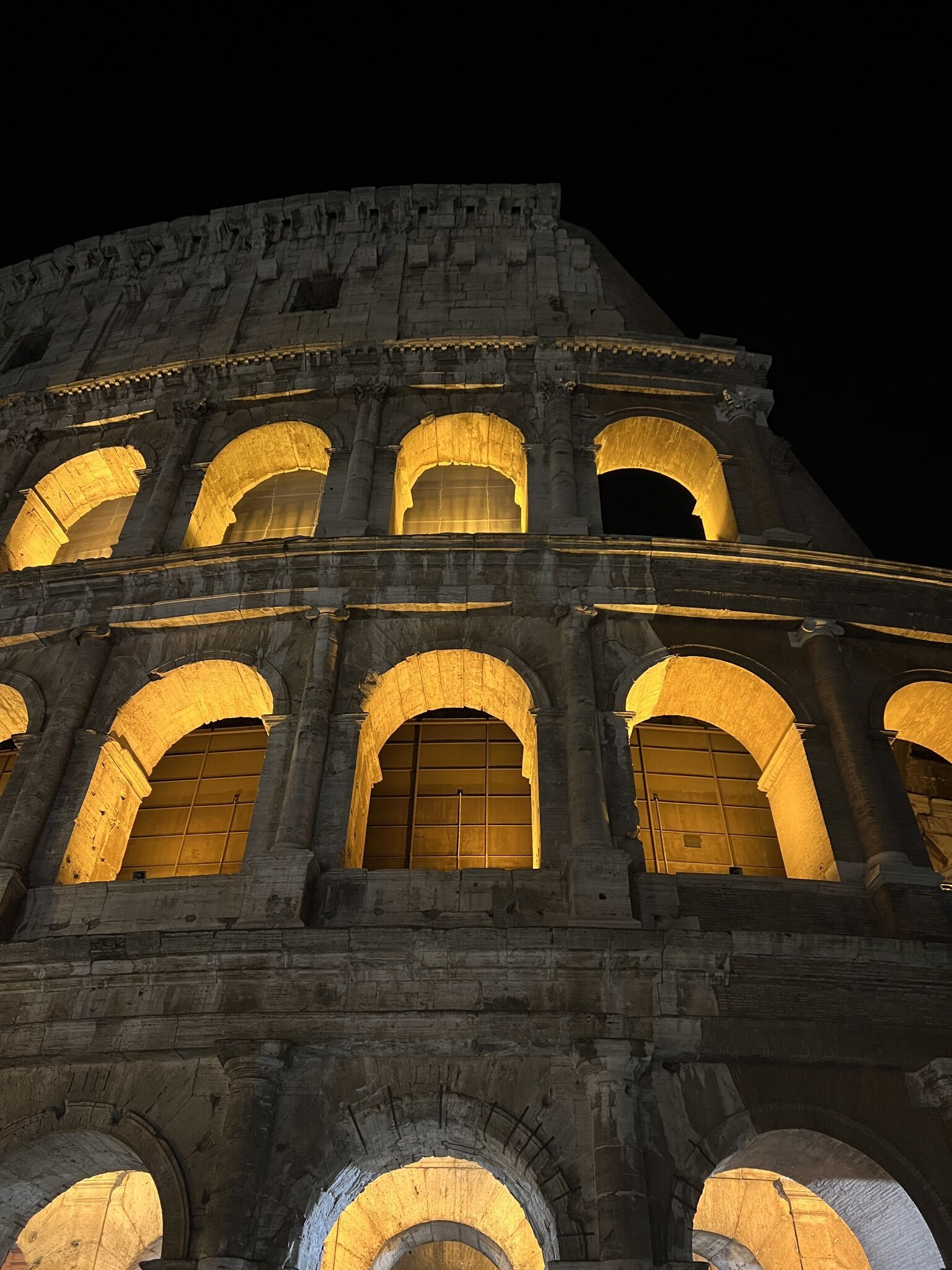 Colosseo visible from Via di San Bonaventura at dusk, Rome