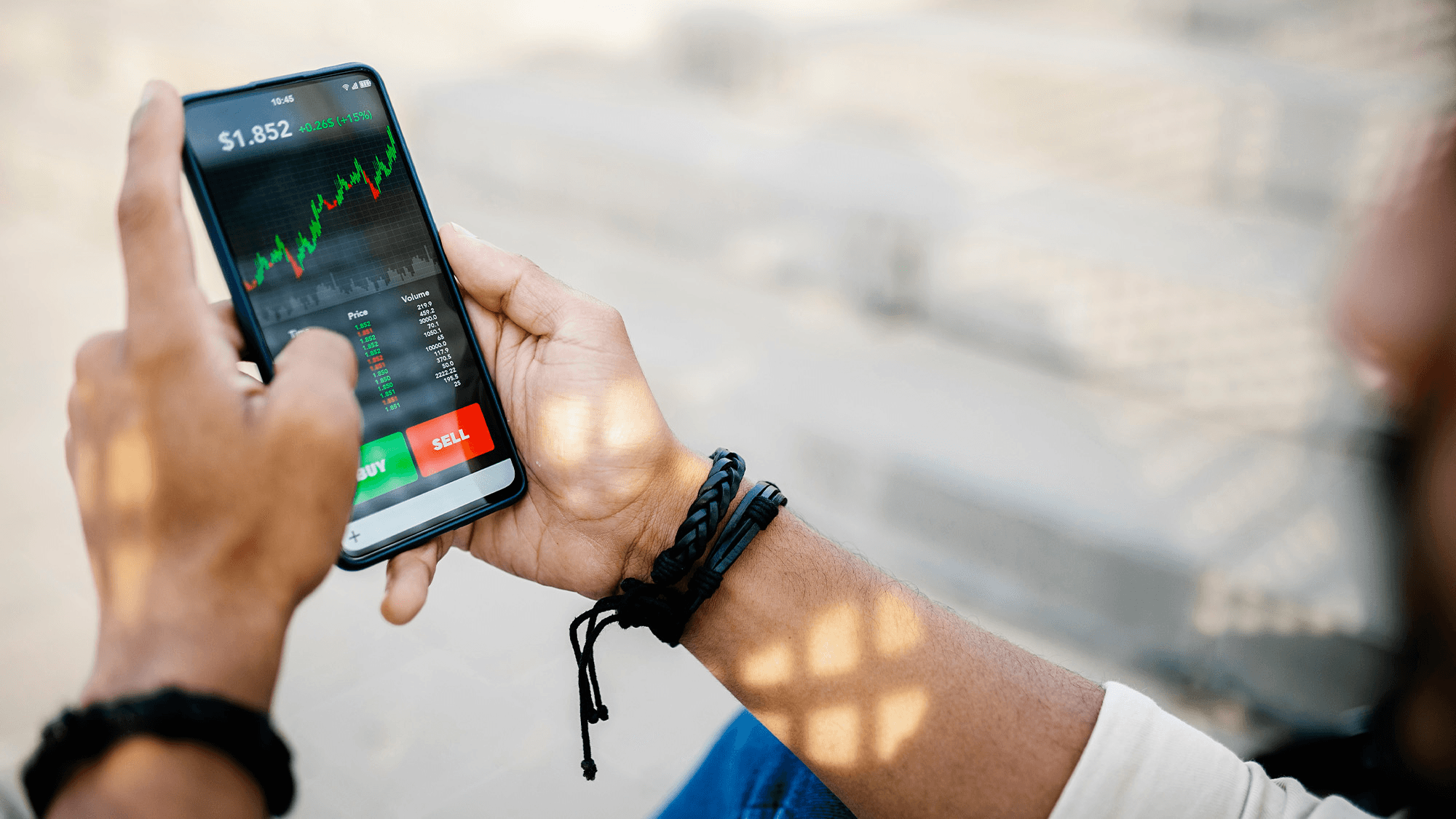 Person monitoring mobile stock trading app - How to Bet on Polymarket in the US