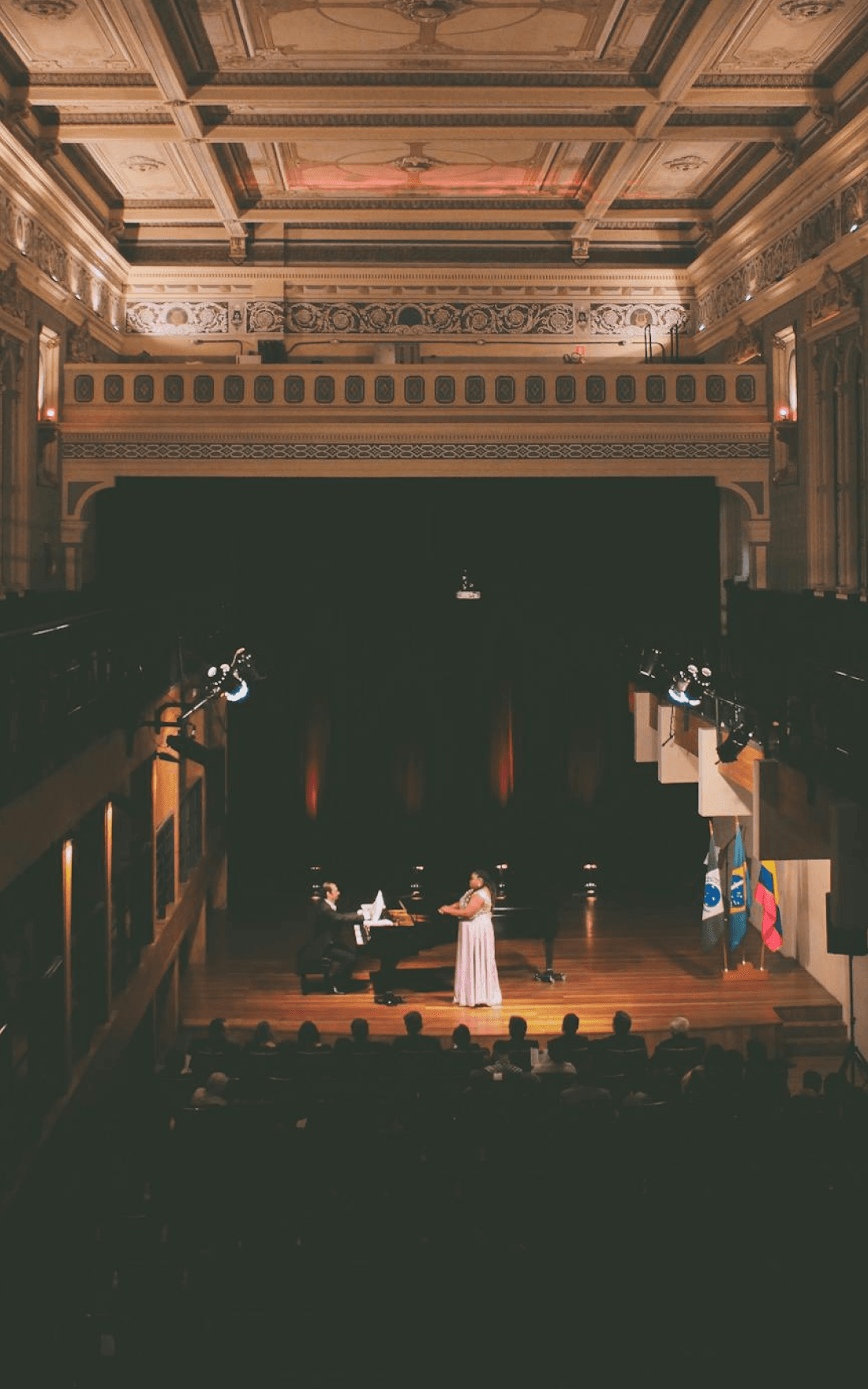 people walking near white concrete building during daytime