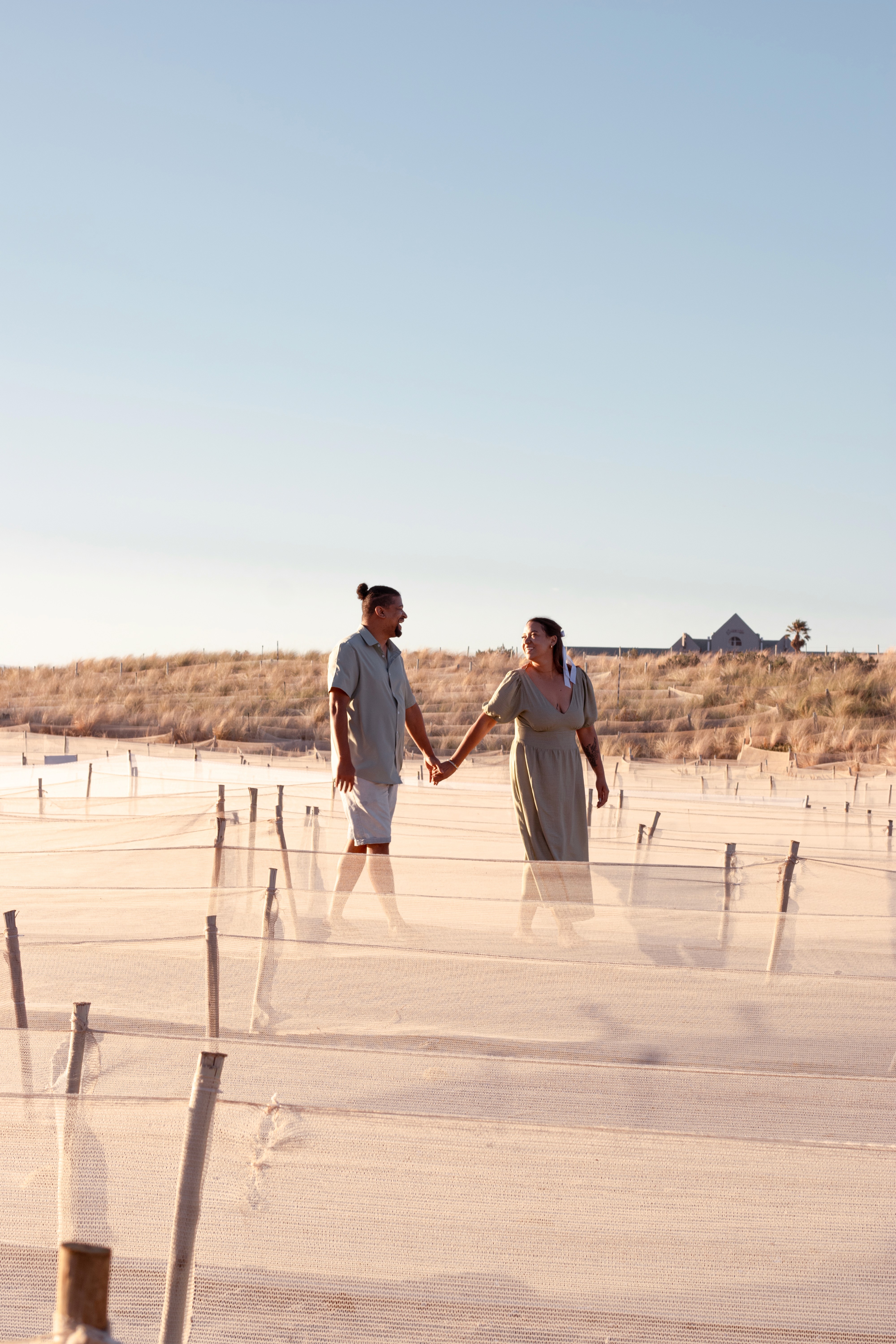 a couple on dunes