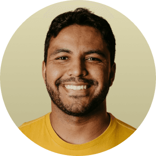 woman in white crew neck shirt smiling