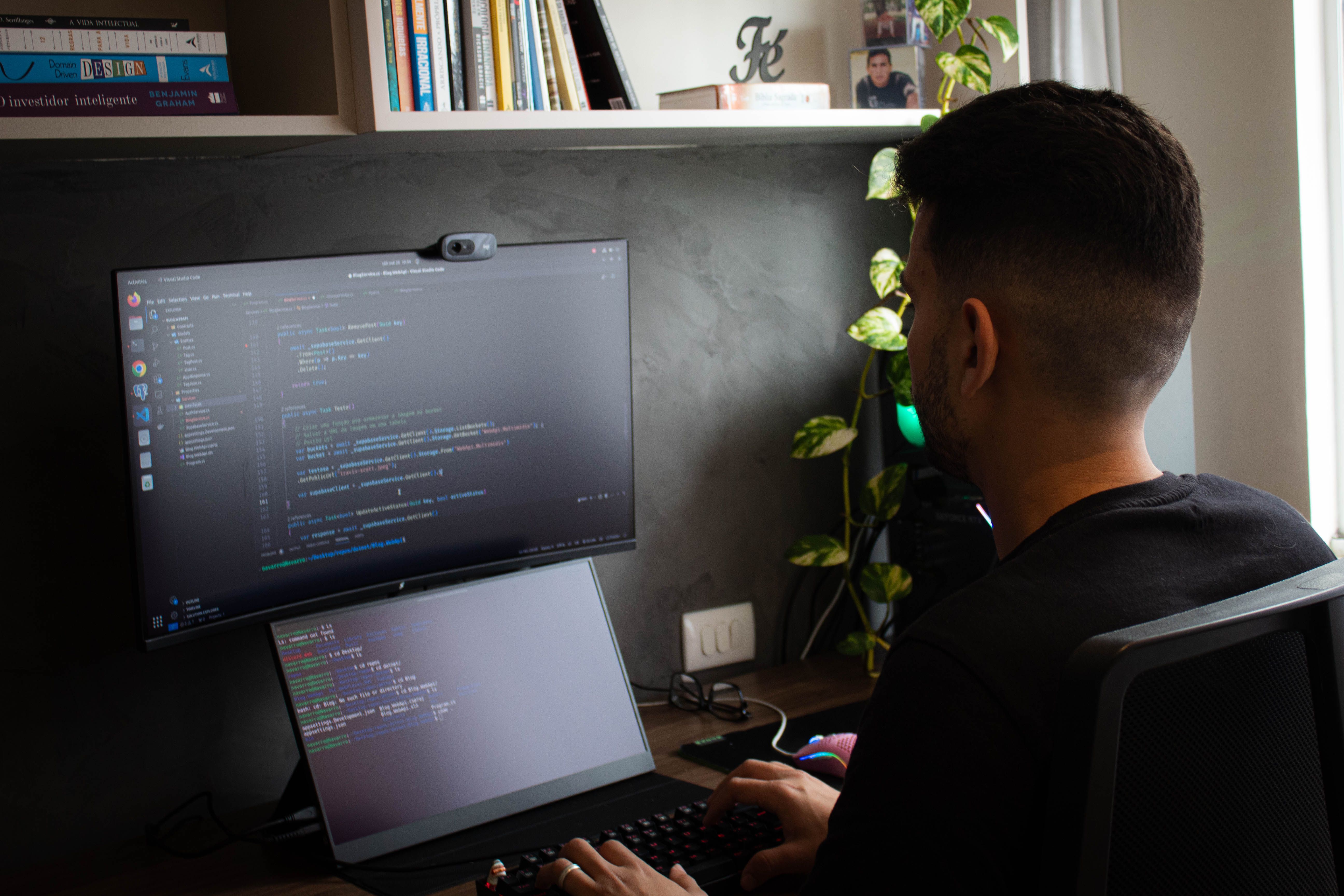 Engineer analyzing a complex system dashboard, representing the debugging challenges teams face when AI agent pilots reach production without observability
