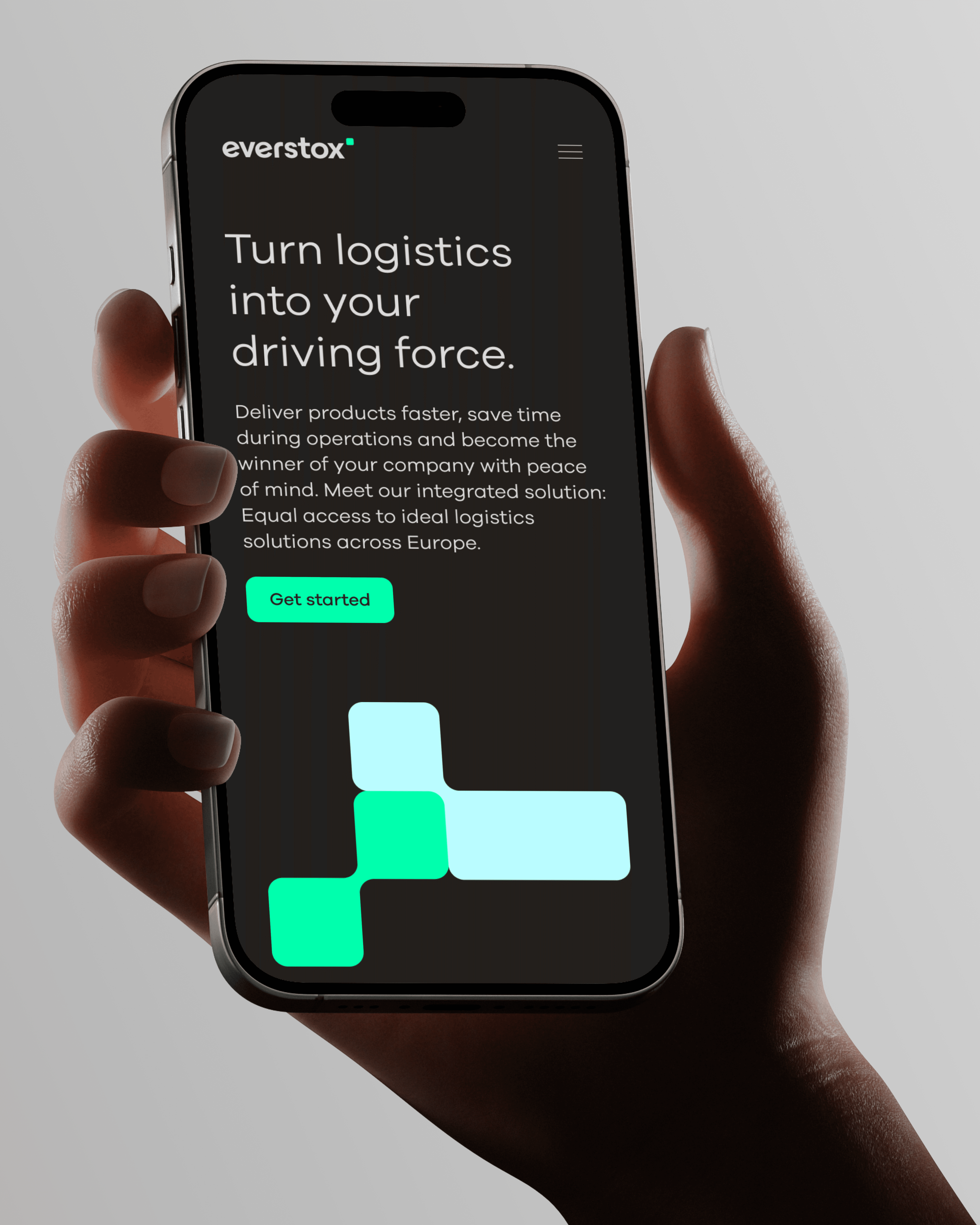Everstox mobile app displayed on a smartphone in hand, showing the hero headline 'Turn logistics into your driving force' with a green CTA button