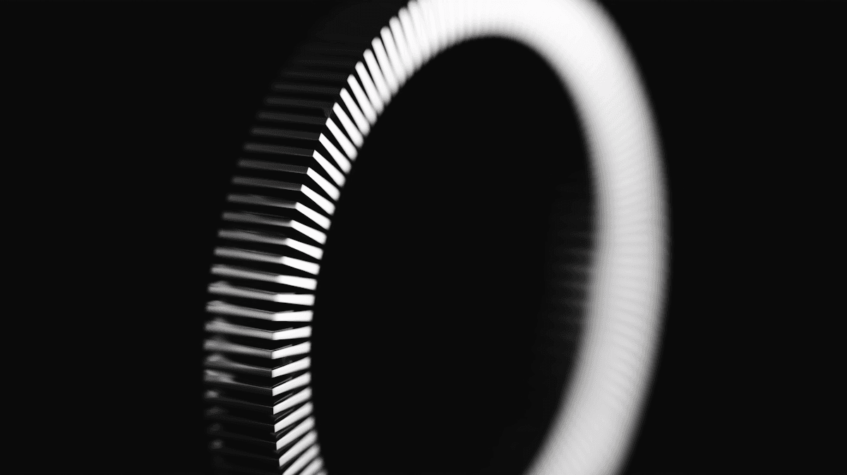 A group of people sitting at tables under umbrellas