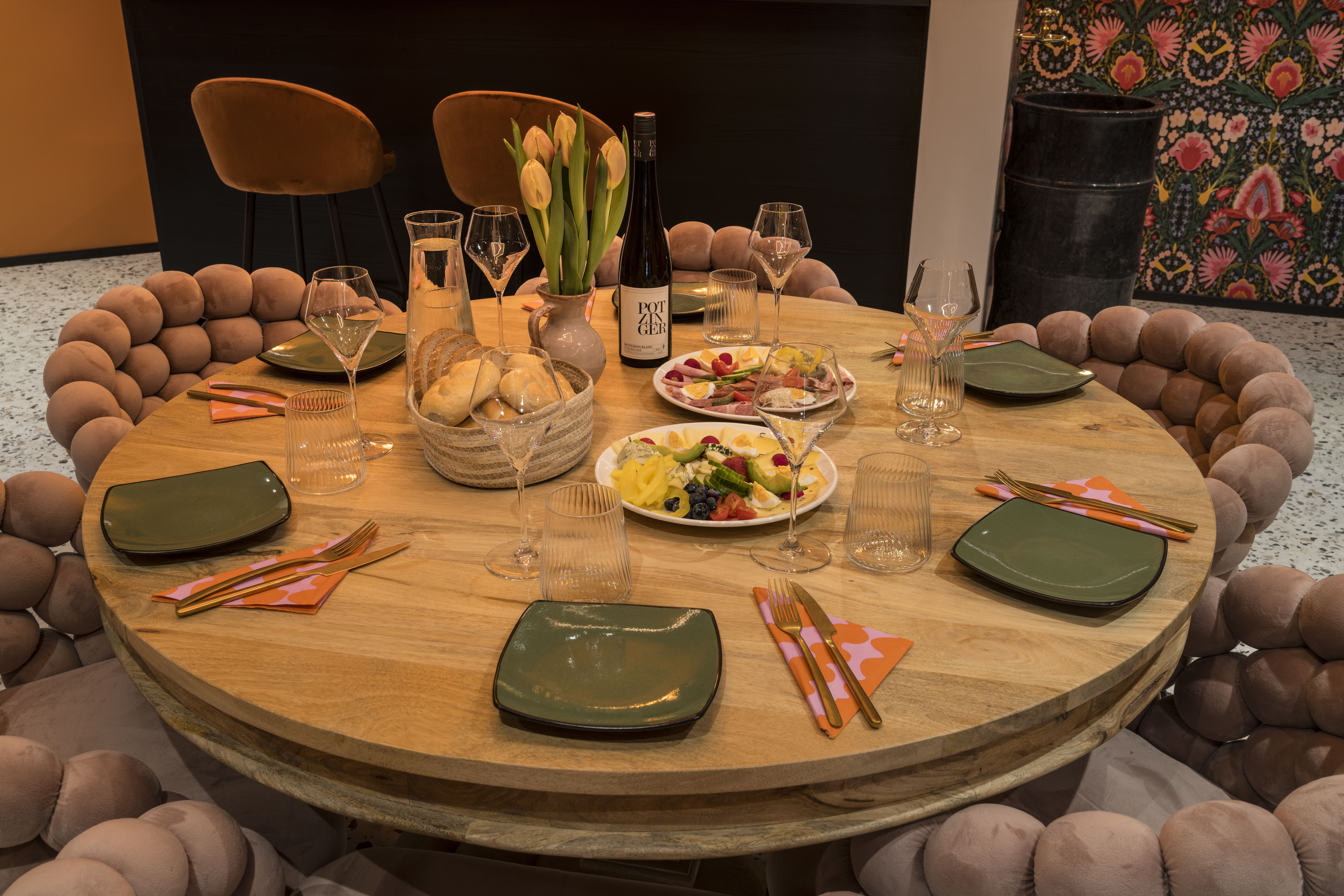 nfinity pool blending into the ocean view, minimalist sun loungers in soft neutral fabric, curved architecture