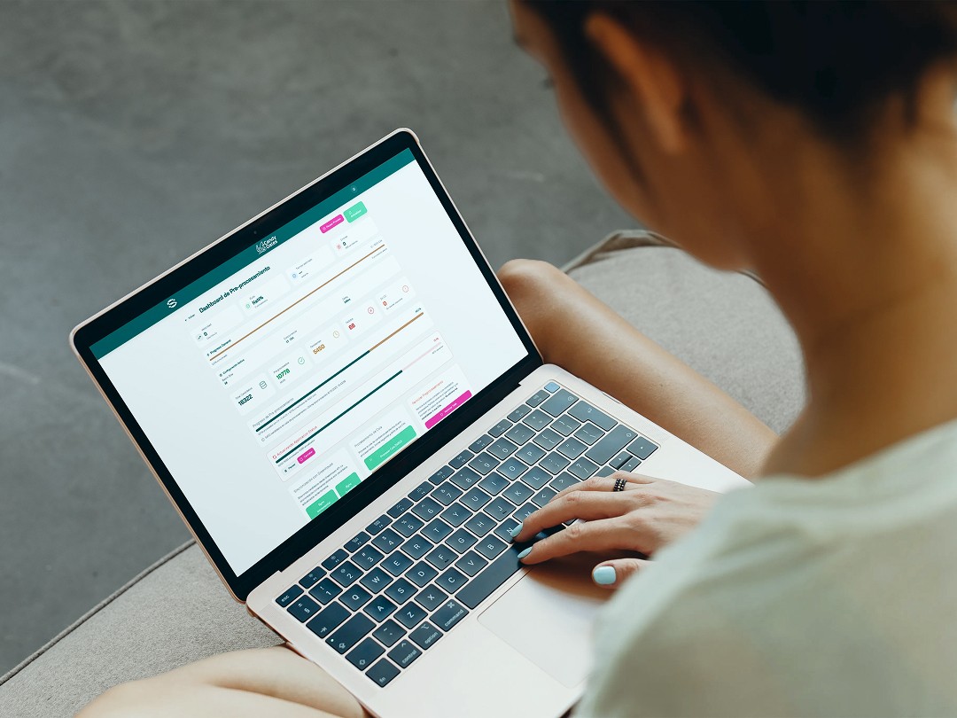 Three men cooking food on an outdoor grill.