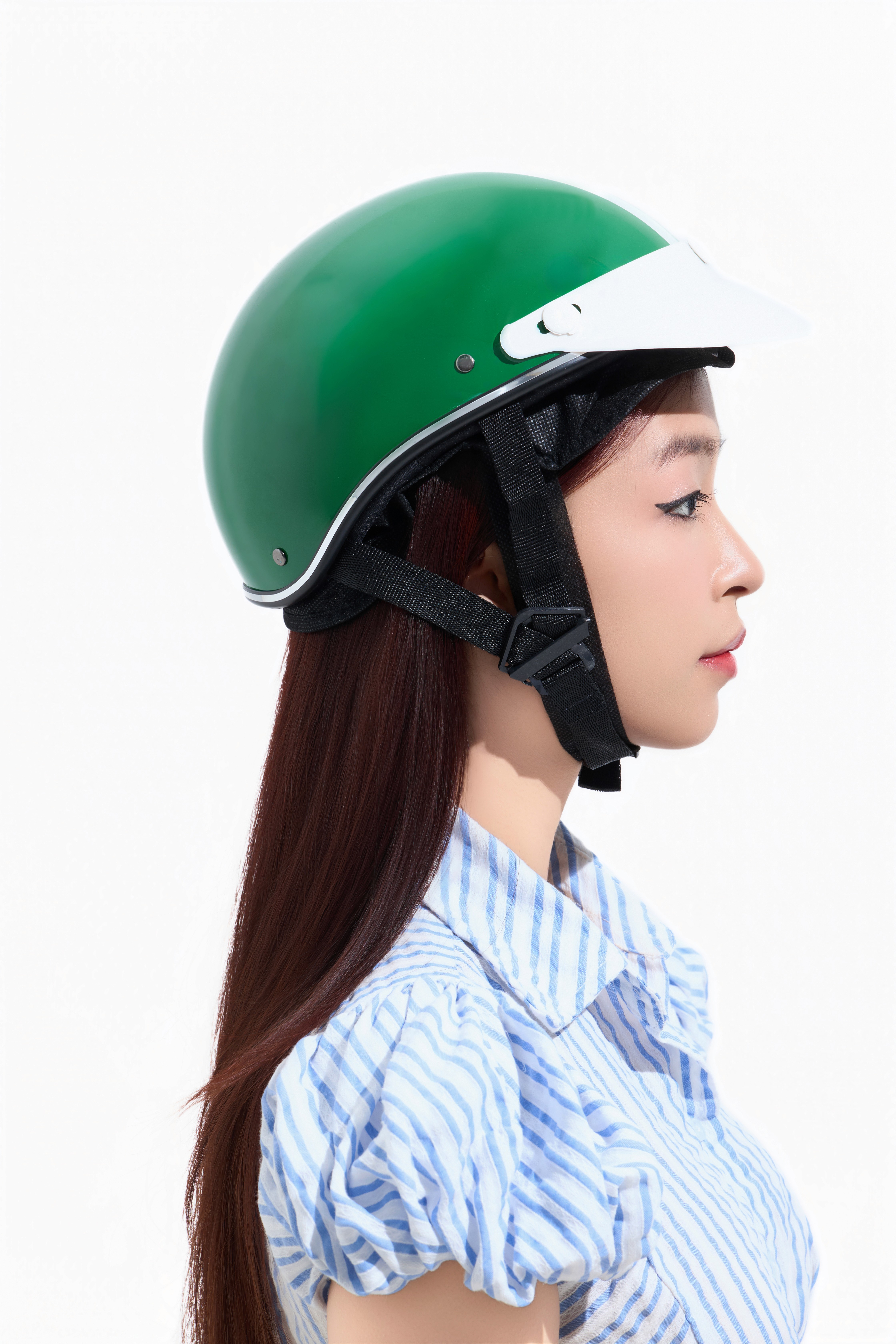 Woman showing her face in the sun