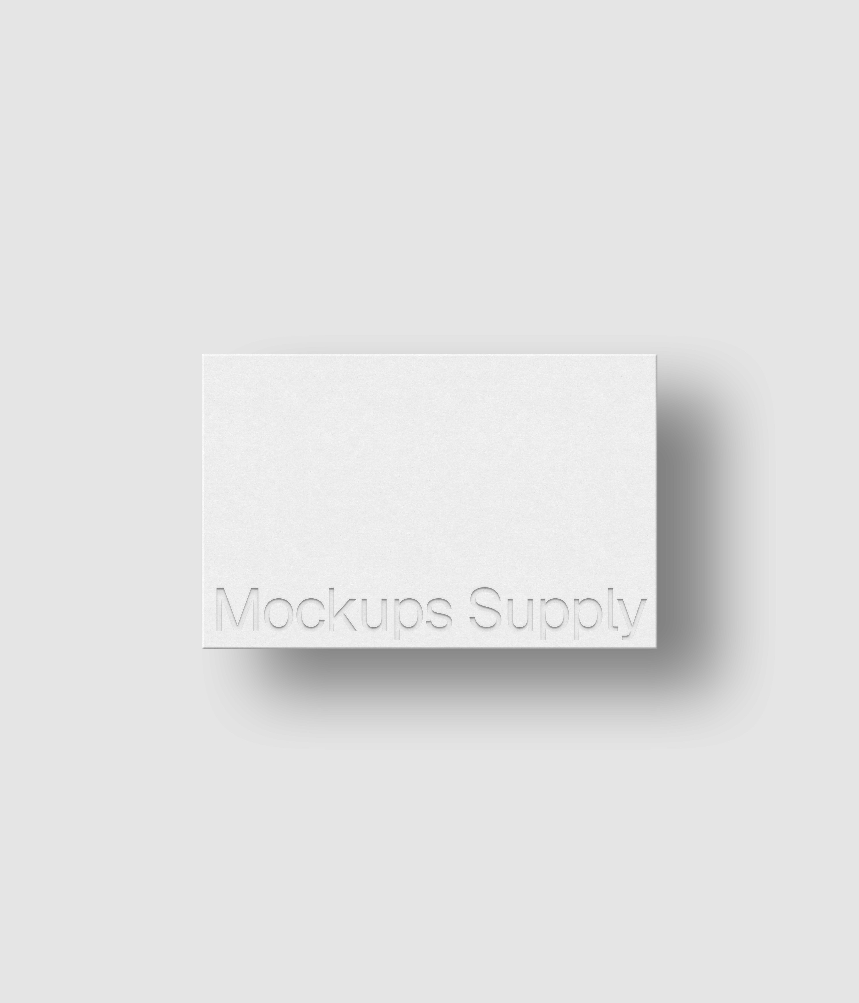 European business card mockup landscape for Photoshop with shadow and debossed text effect, white card on white background, minimal branding and stationery presentation
