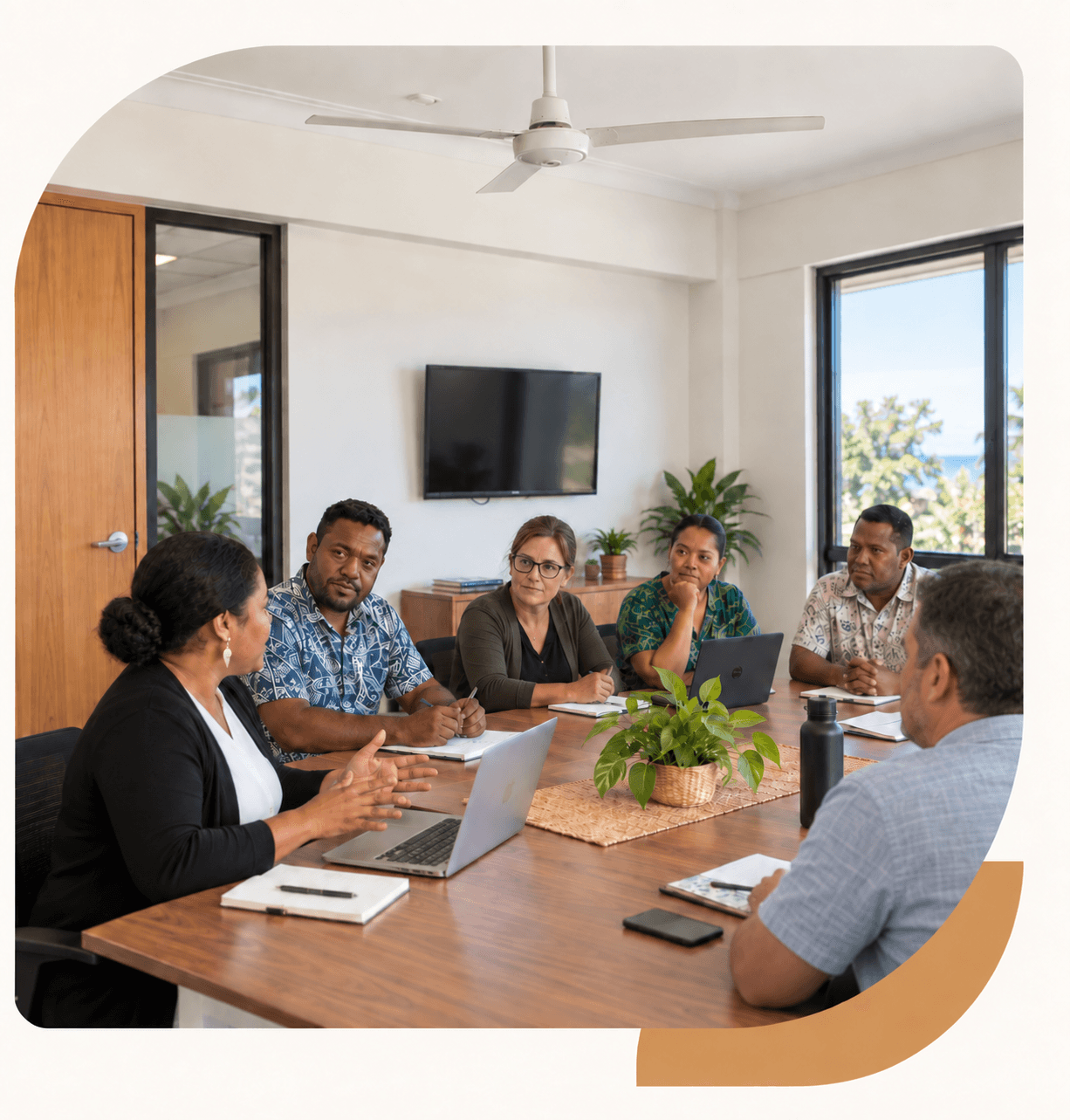 Pacific leaders collaborating in a workplace meeting.