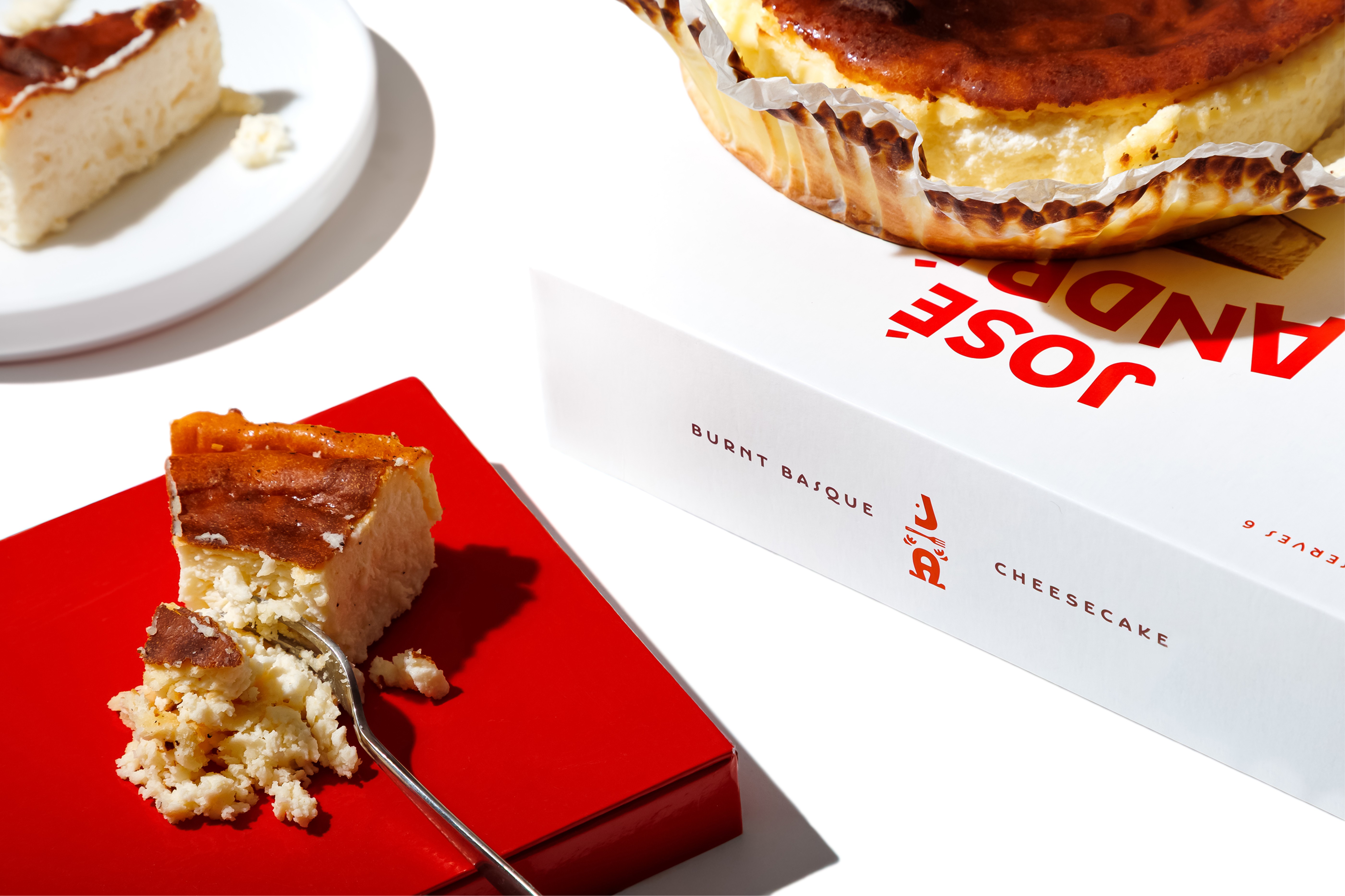 Streetside billboard with flyposters of the Batch.Works brand and illustrations