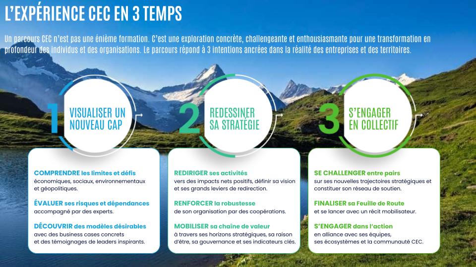 A young person with curly hair smiles at the camera while sitting in front of a laptop against a dark background.