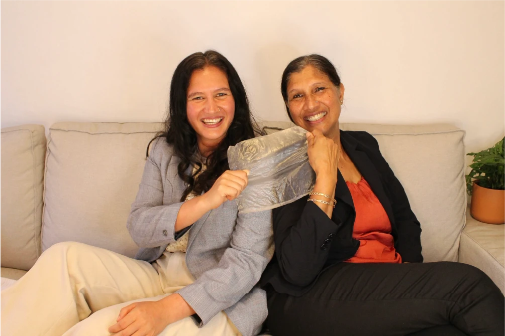 Co-founders Priyanka and Alka smiling, representing the mission and legacy.