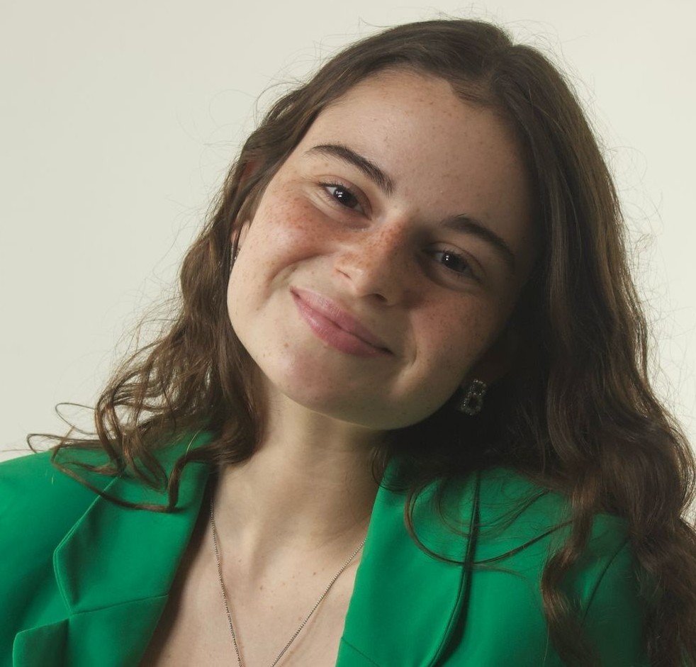 headshot of female in bright background