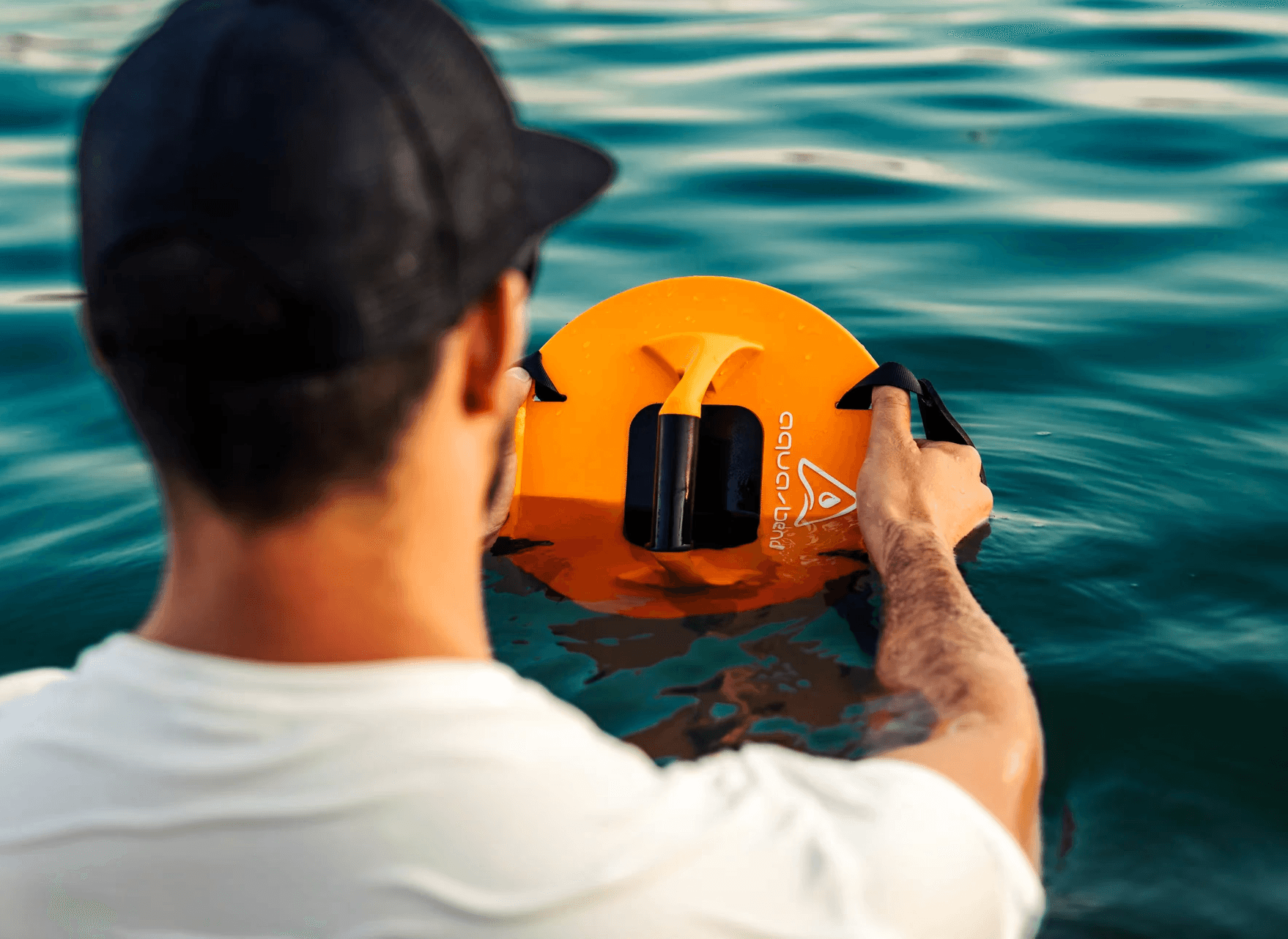 Man holding Aqua-Bend FLEX disc with both hands in duag grip for press exercises