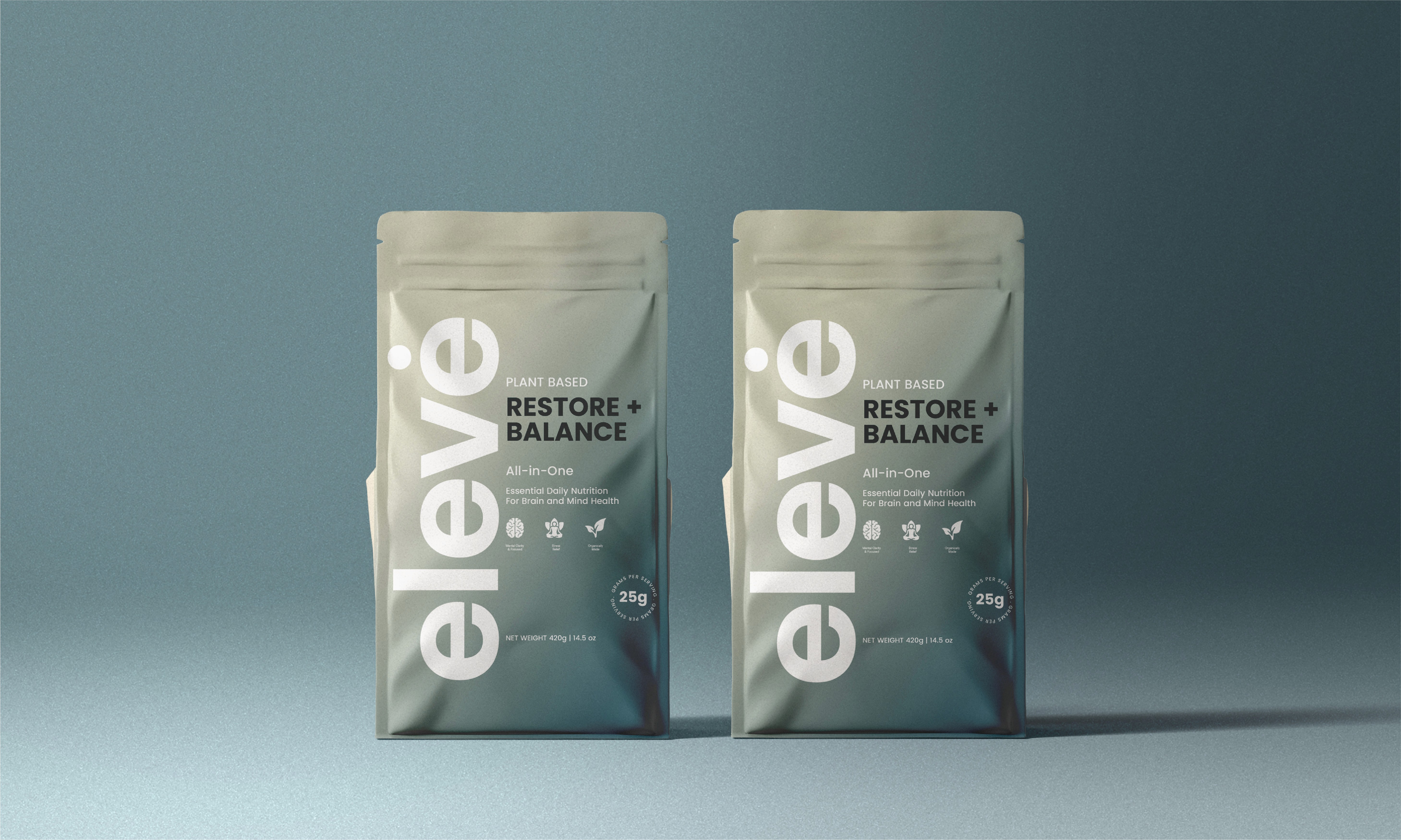 Close-up of a yellow tennis ball sitting on a green court, positioned near the white center line.