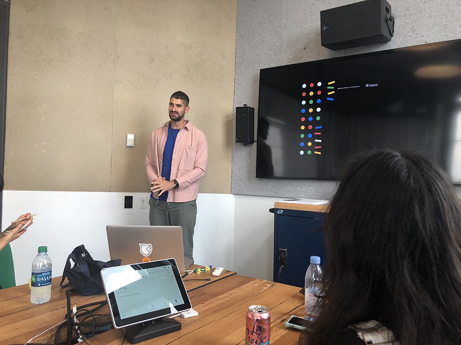 a course class with students and the teacher presenting the design lesson